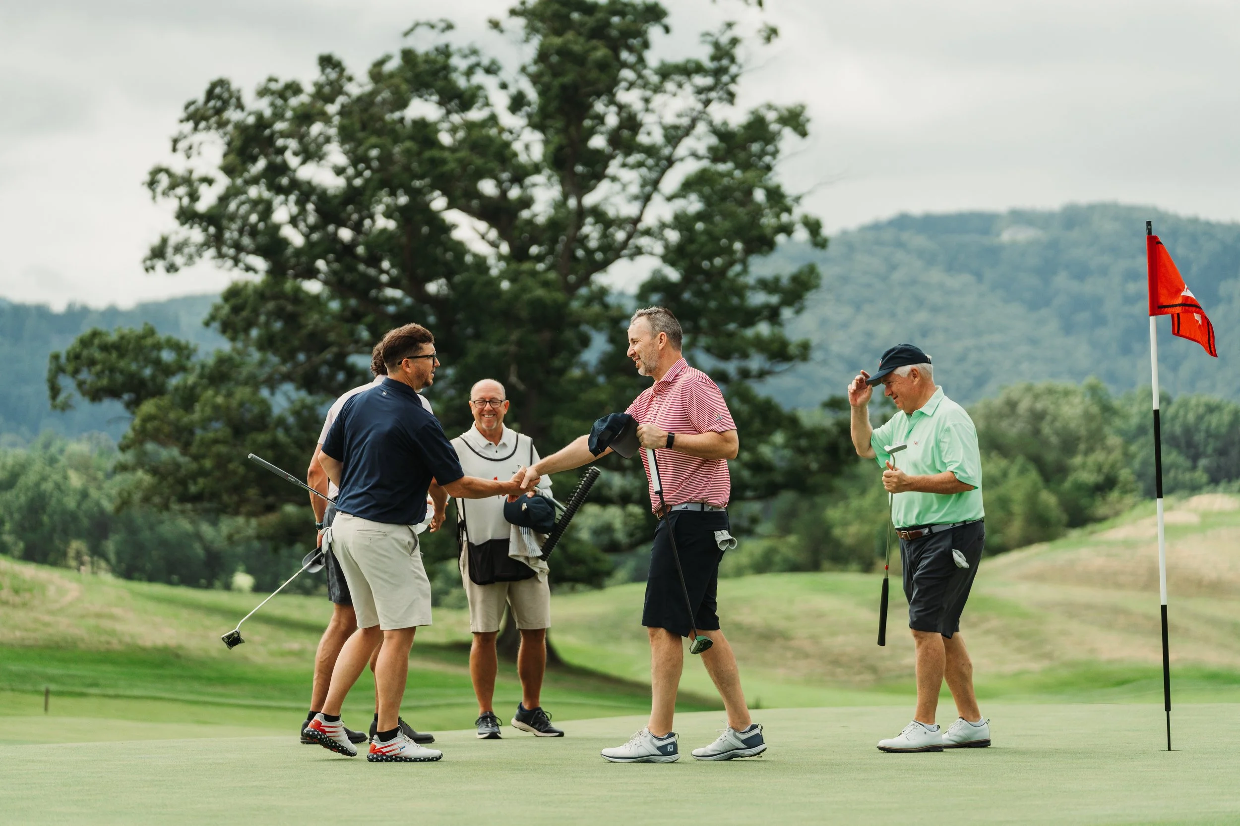 Group of golfers celebrating a round at Ballyhack, a Dormie Network golf club