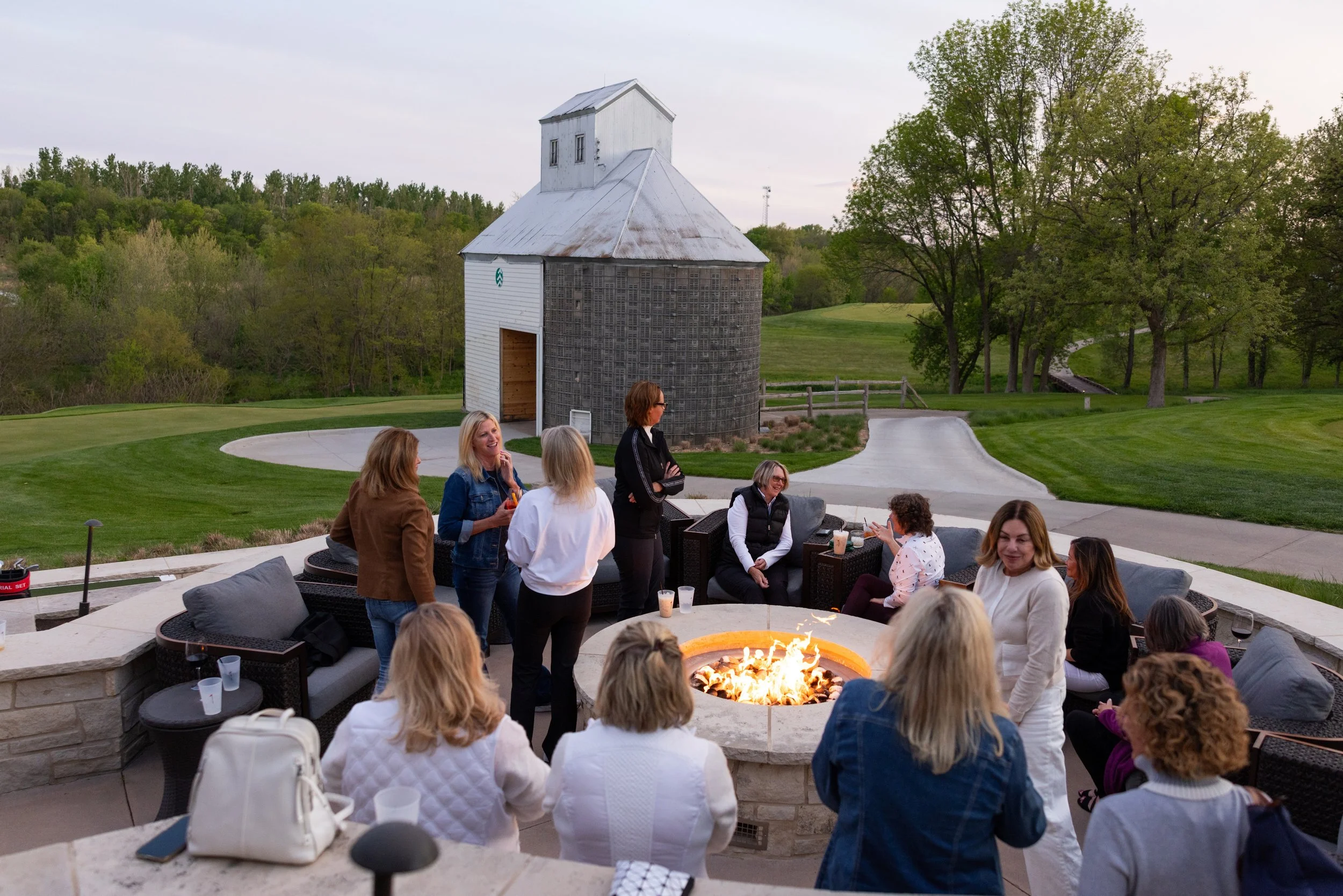 Group of ladies socializing at ArborLinks, a Dormie Network golf club