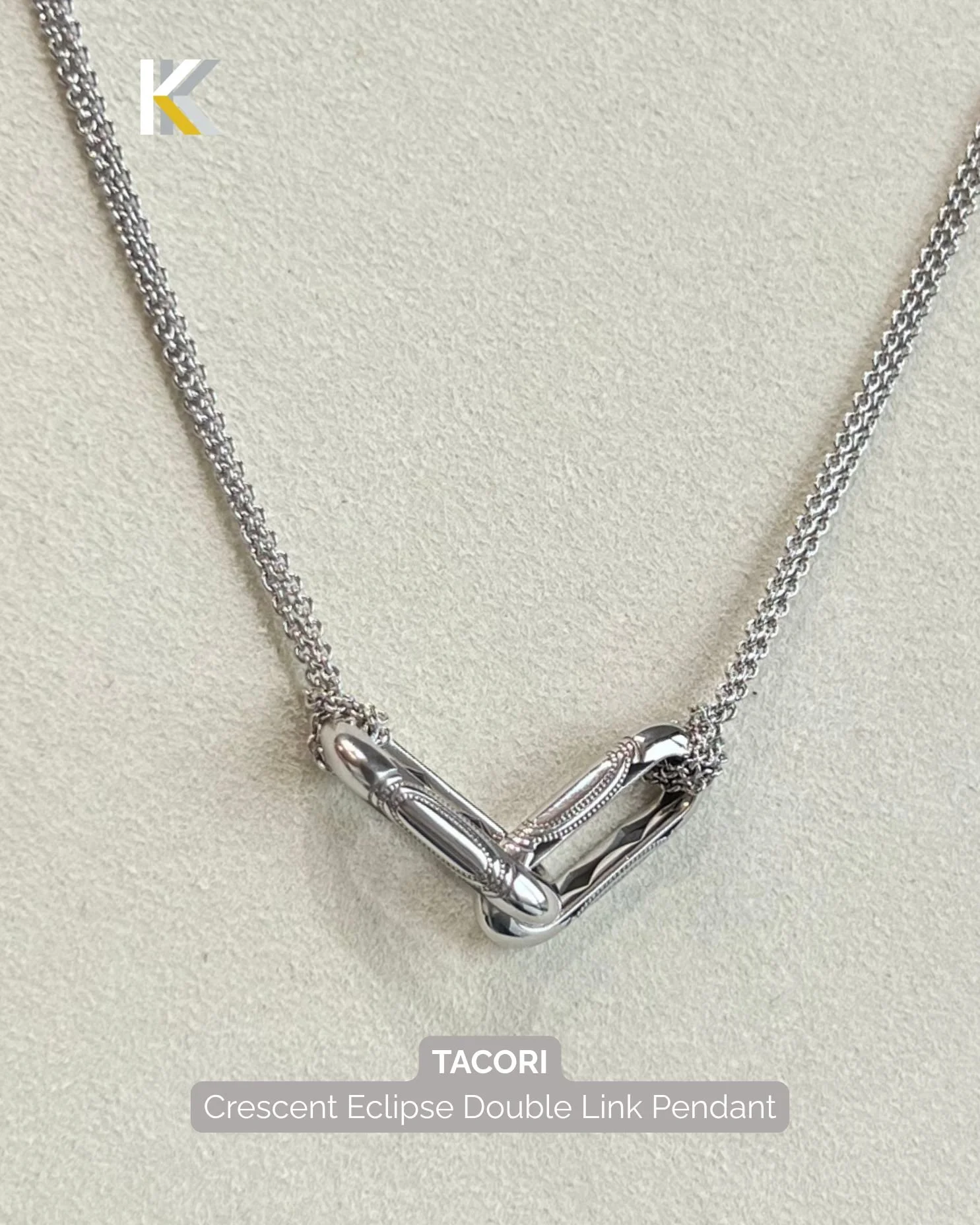 Two high-polish sterling silver links, interlocked and finished with subtle milgrain detail. 
Who else is obsessed with that signature detailing?