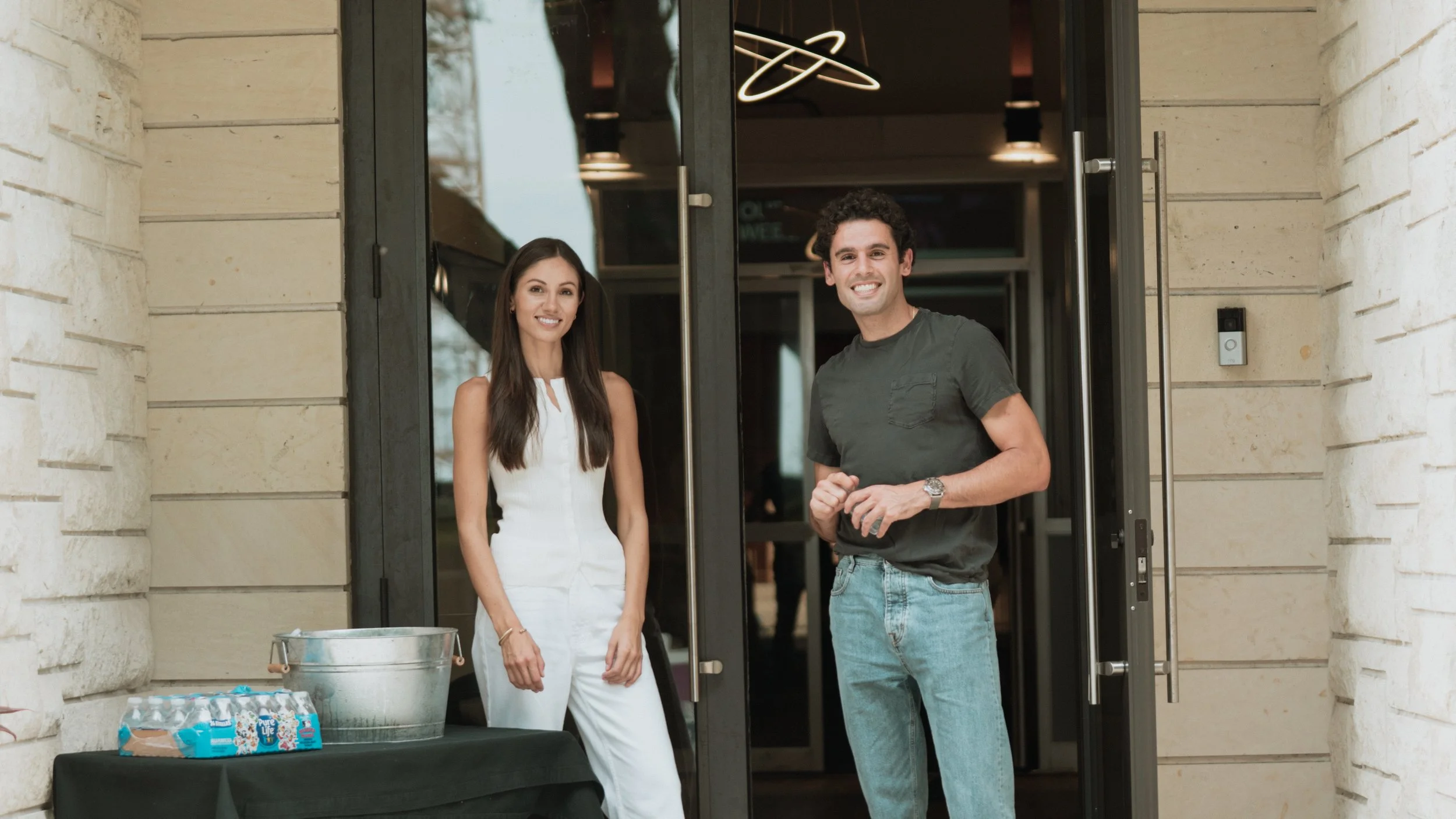 two people greeting outside church
