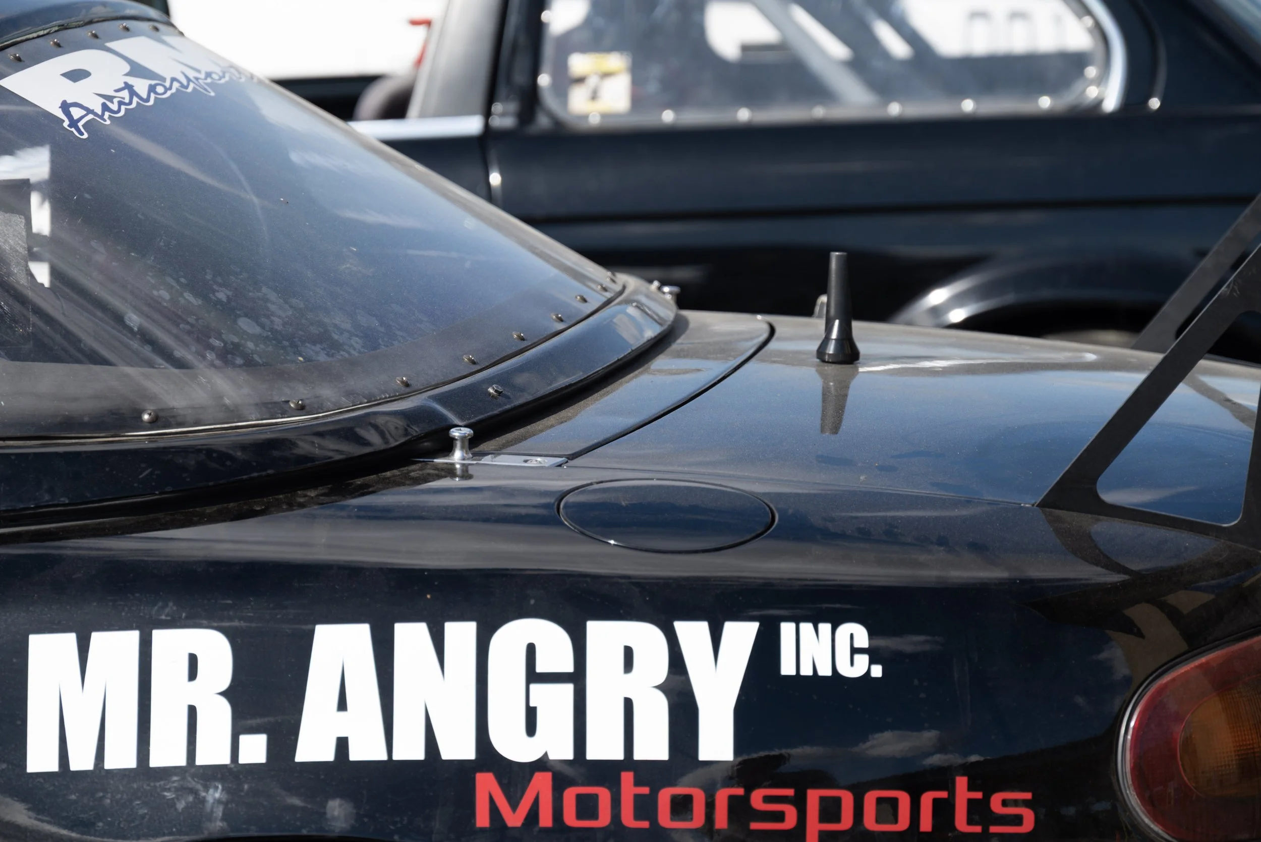 Photograph of a car’s side detail captured at Sonoma Raceway.