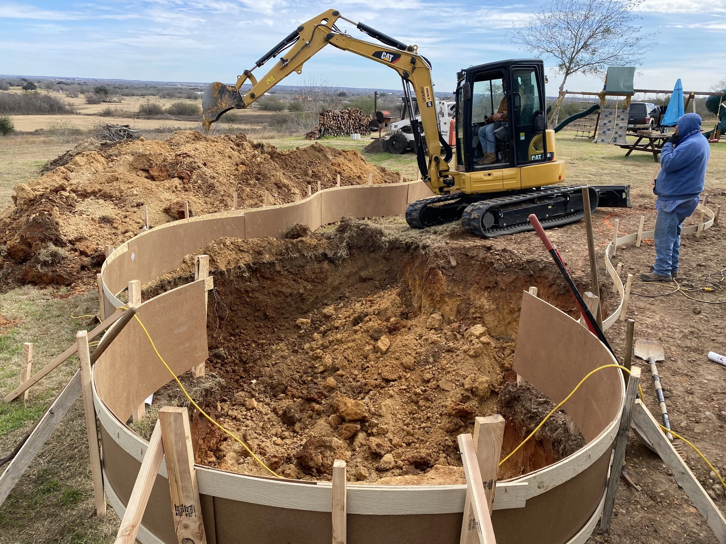 Pool excavation in expansion soil will be over-dug 12″ and backfilled with gravel to help stabilize the foundation of the pool and prevent shifting in the soil.