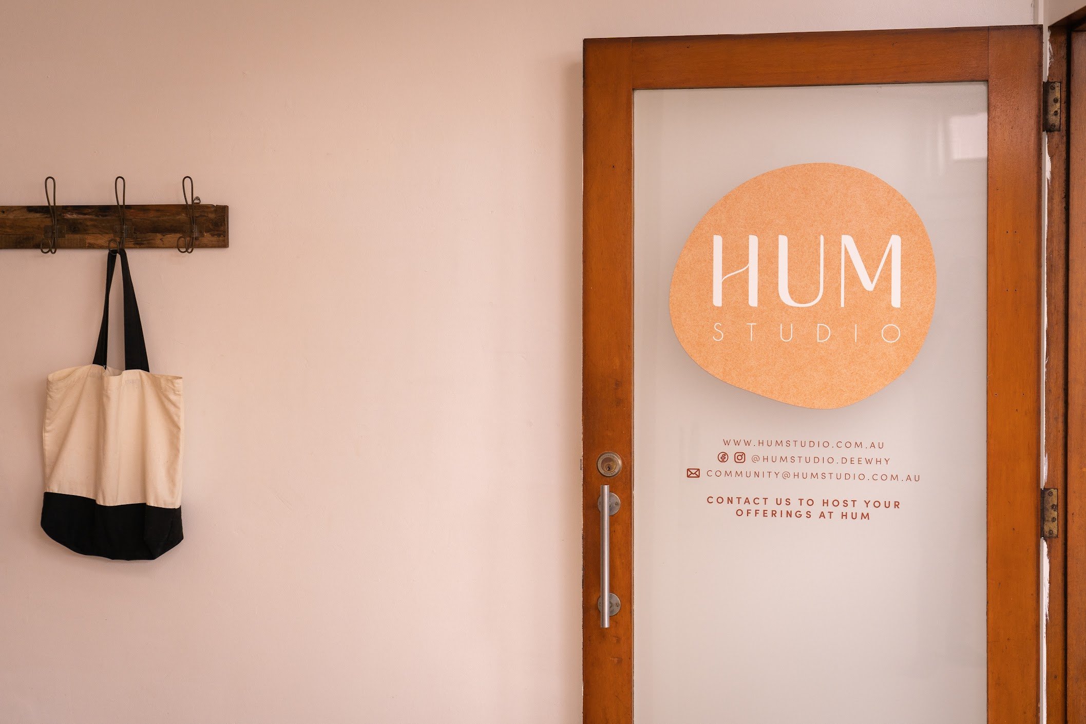 HUM Studio Dee Why in the Northern Beaches, door showing signage and setting for yoga and pilates studio