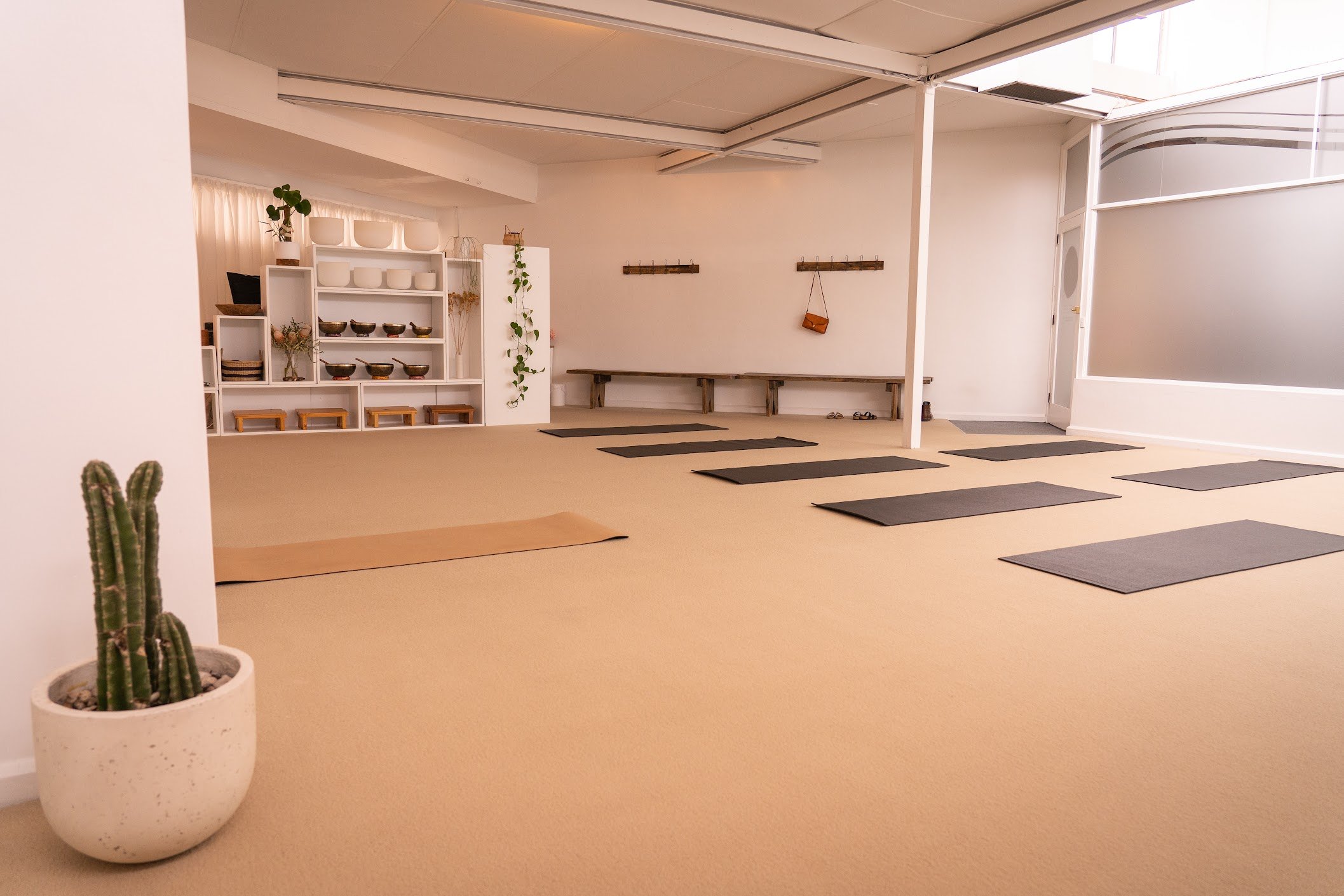 HUM Studio Dee Why in the Northern Beaches, yoga mats, bolsters and blocks set up for a yoga or pilates class