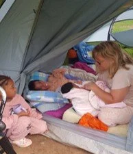 Leigh teaching the next gen how to camp