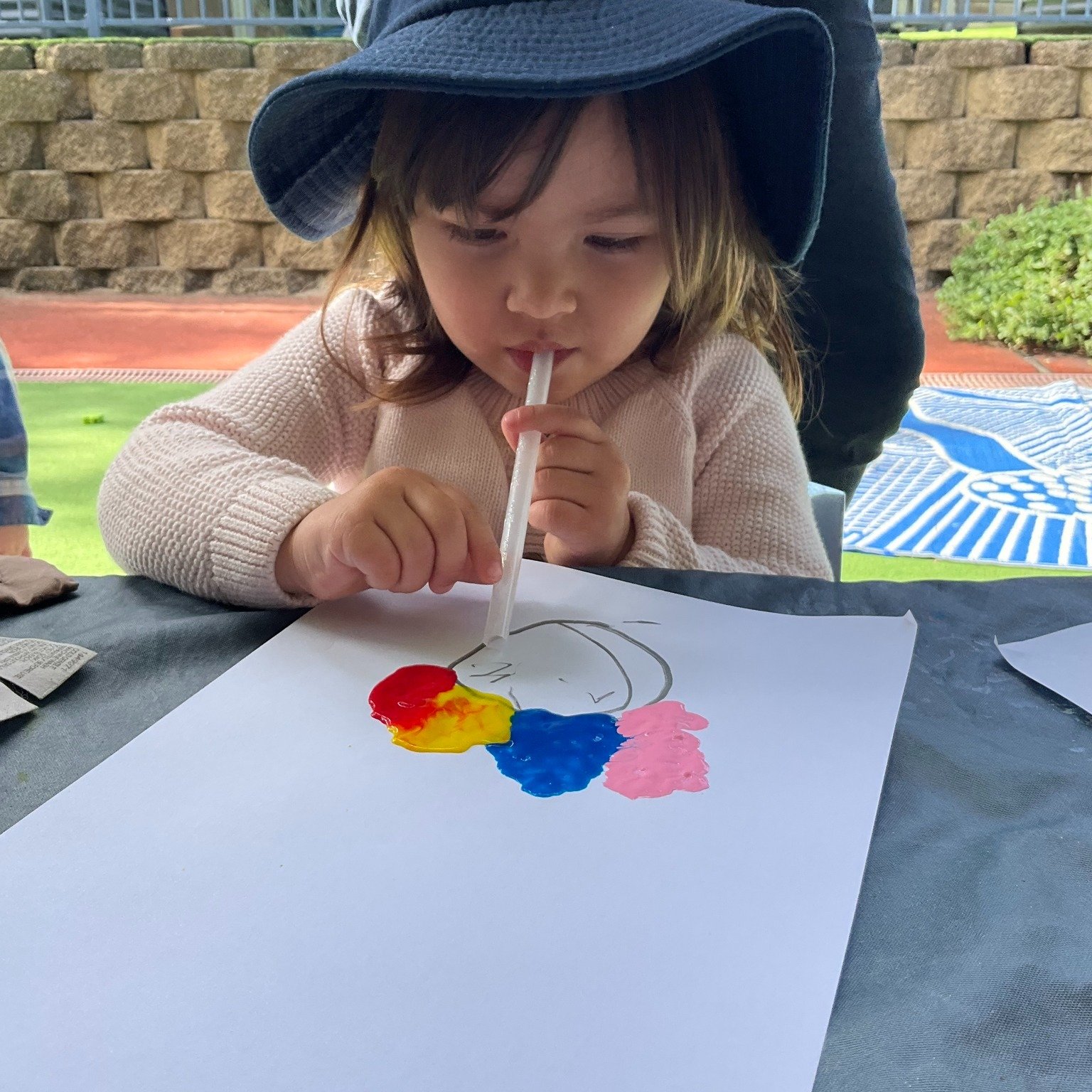 With a straw in hand and a splash of paint, our friends created the coolest art using the power of their own breath! 🎨💨

Paint was carefully placed at the top of a drawn head, and with a few deep breaths and lots of giggles, colourful &ldquo;hair&r