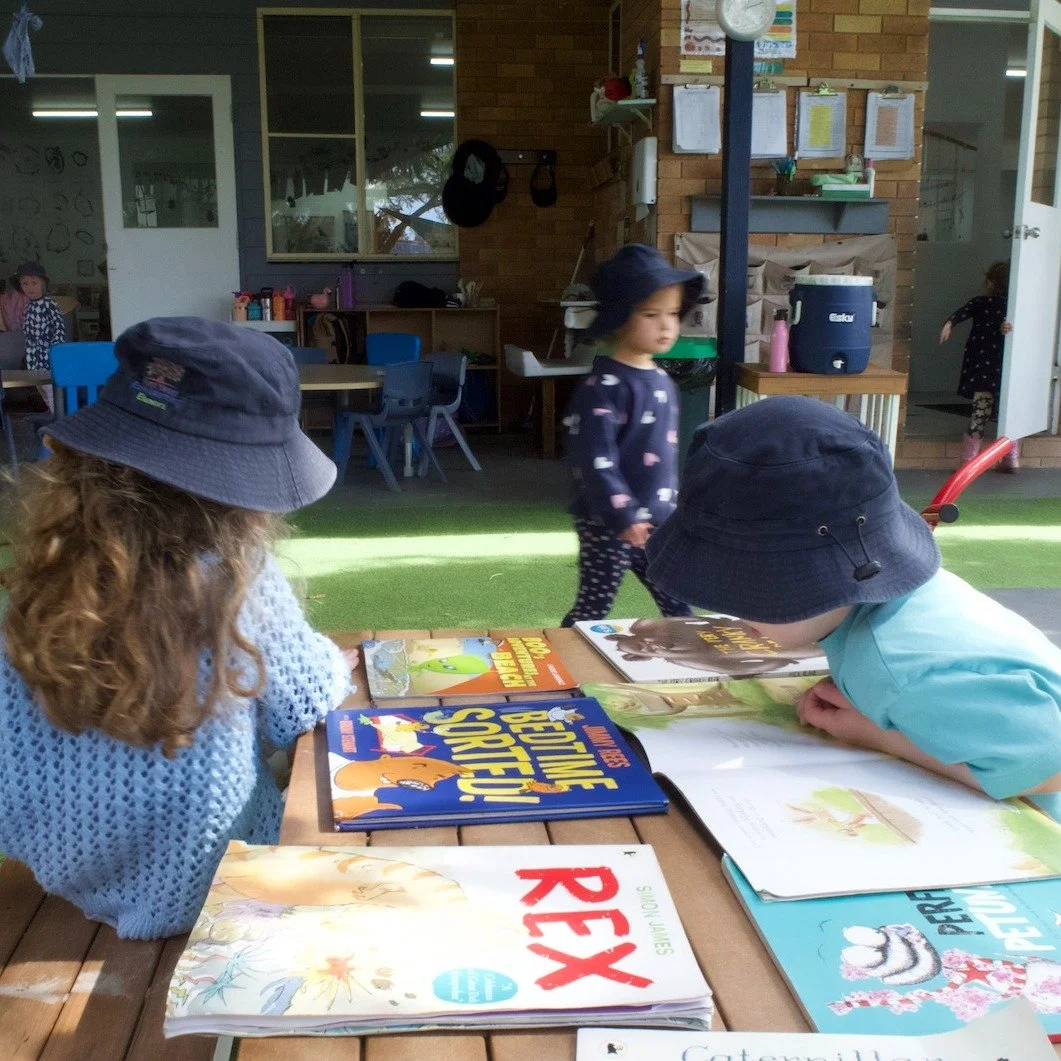 We set up a cosy book space outdoors today and welcomed our friends to come, sit, and read at their own pace. 🌞📚 Some friends curled up quietly with their chosen stories, while others leaned in together, sharing pages and pointing out their favouri