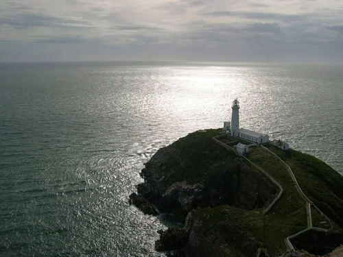 Lighthouse on the North Wales coast, representing the North Wales Way road trip