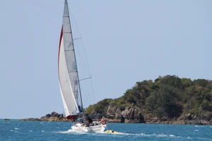 Sailing boat and coastal scenery on the Cumbria Coastal Route