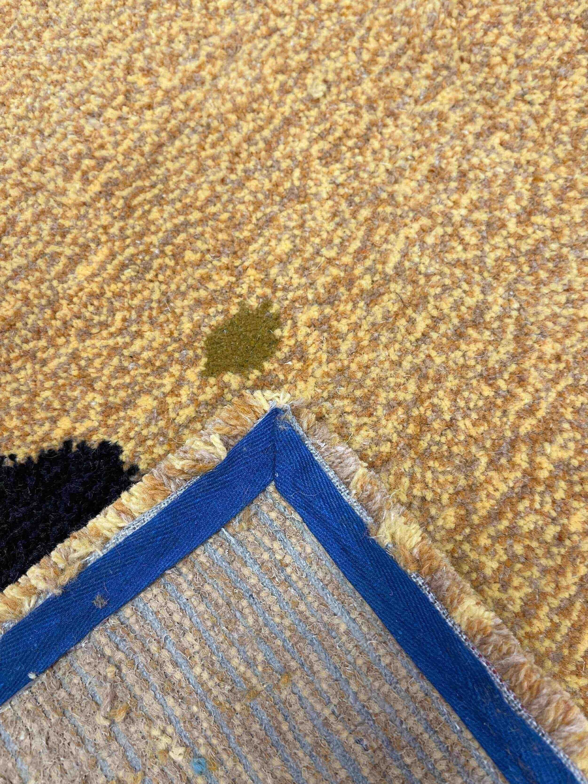 Studio-tuft-seaglass-neutral-handmade-tufted-rug-back.jpg