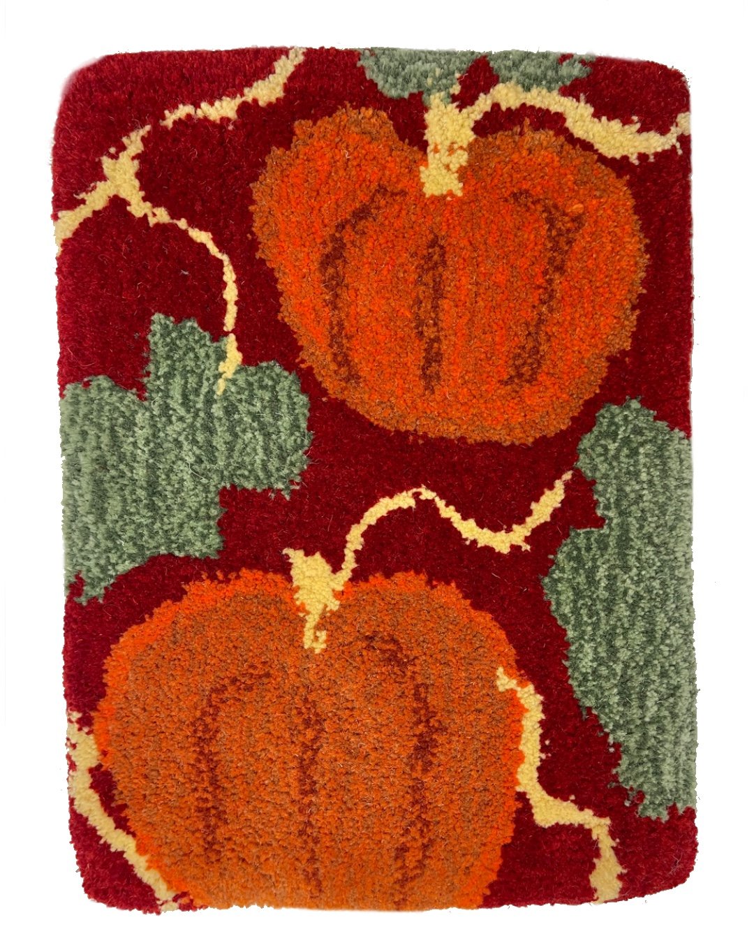 Studio-Tuft-orange-red-pumpkin-tufted-wall-hanging.JPG