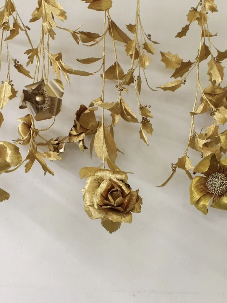 bespoke handmade gold crepe paper flowers for christmas display