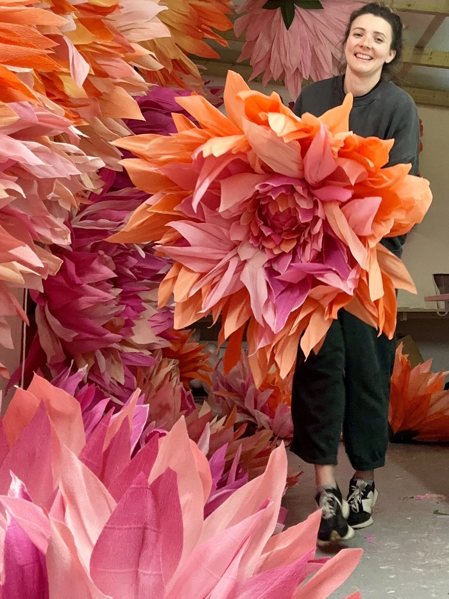 Giant oversized paper dahlia flowers. Handmade in Lewes in the UK for huge wedding installation