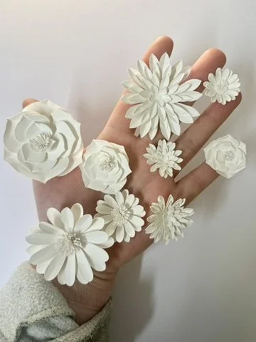 Tiny graphic paper flowers , made bespoke for Faberge display in harrods. prototypes in white