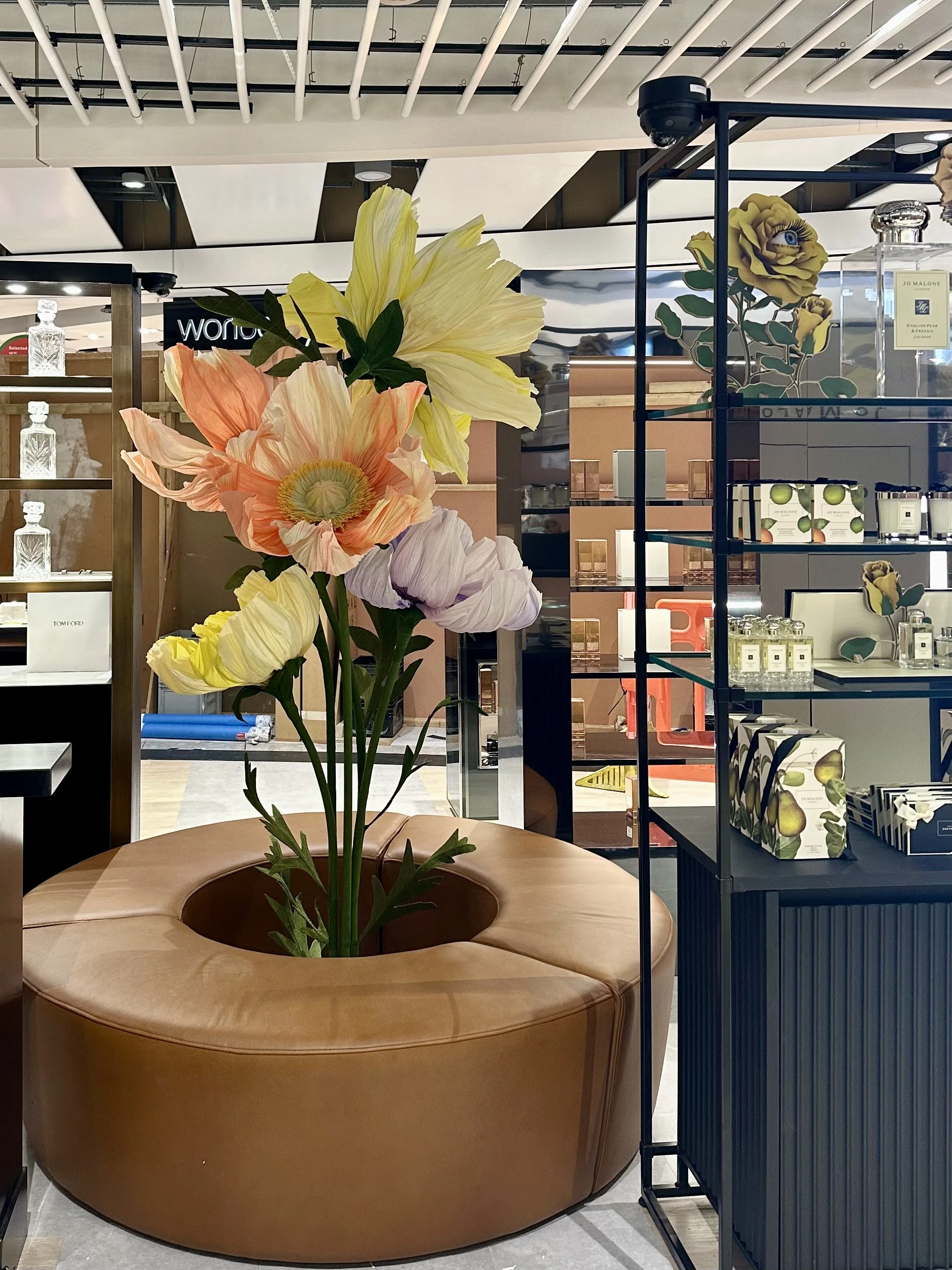 Heathrow airport display of giant paper flowers for Jo Malone London, Estee Lauder, Le Labbo and Tom Ford. 
Pastel coloured paper flowers, handmade in west sussex