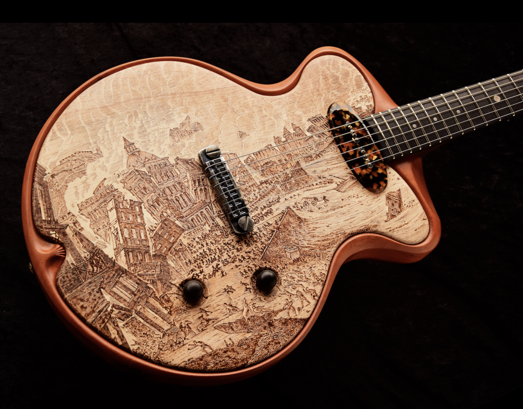 Carcavelos 9  
 
This is a very special member of the Carcavelos guitars family - born out of a collaboration with the artist and pyrography master craftsman Dino Muradian  (James Hetfield of Metallica is a fan).