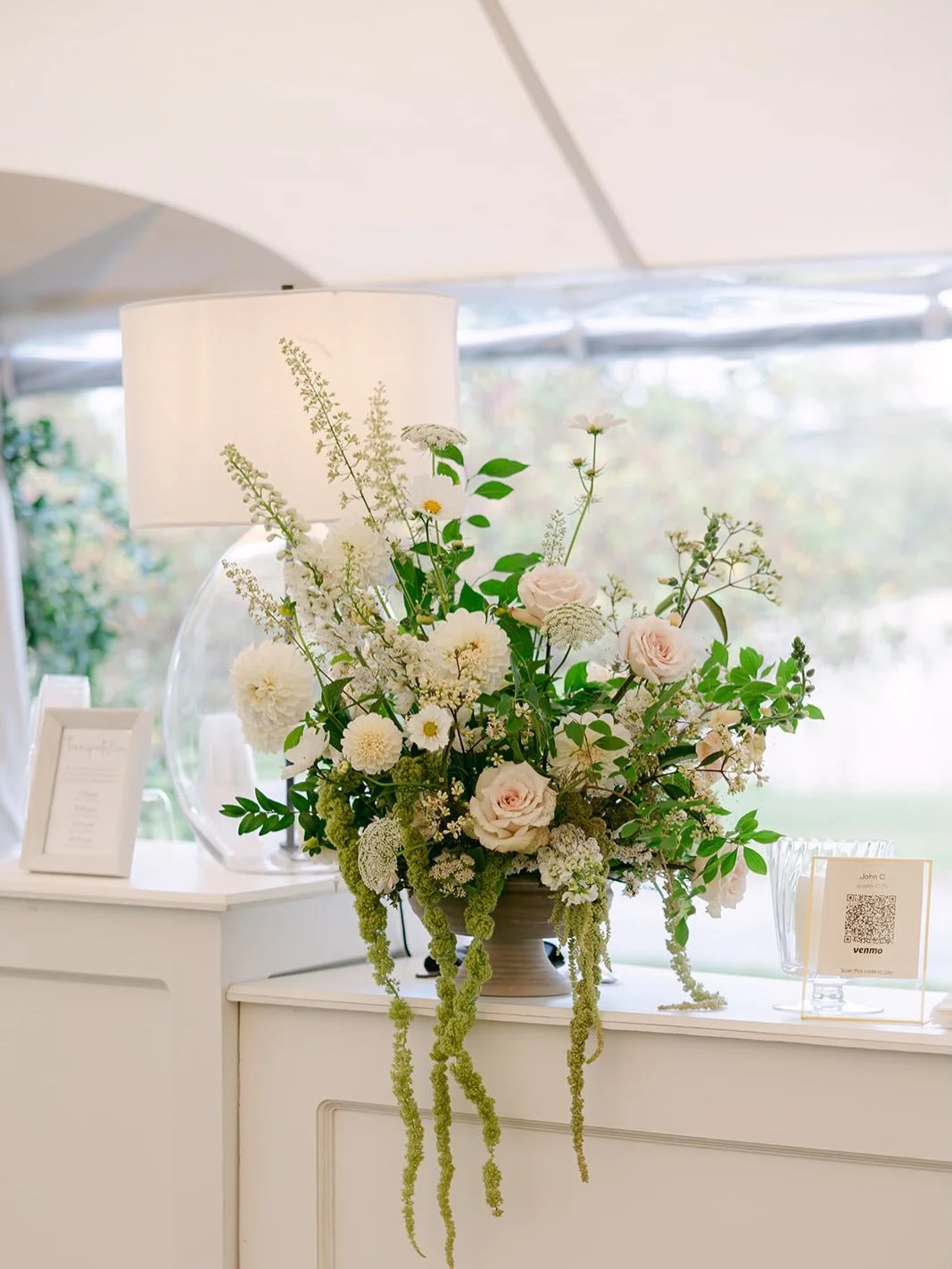 Soft touches of color creating a late summer glow.

Photography: @rachelbuckleyweddings 
Planning: @landfalldesigns 
Catering: @frenchpicniccatering 
Lighting: @griffingriffinlighting 
Florist: @honeysuckleway