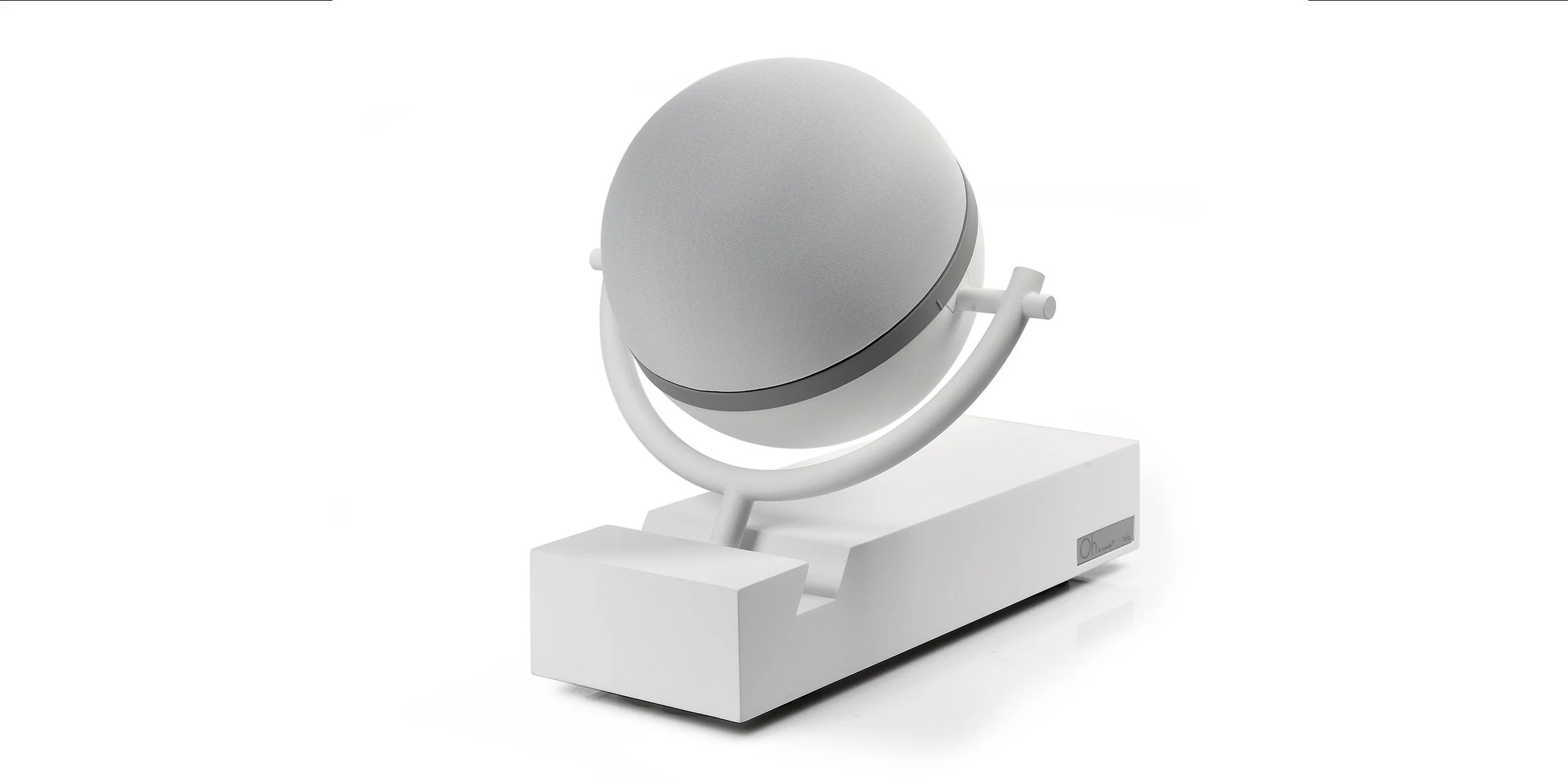 Tutondo self-standing satellite speaker with spherical driver and support base, designed for mid and high frequencies and flexible home audio placement.