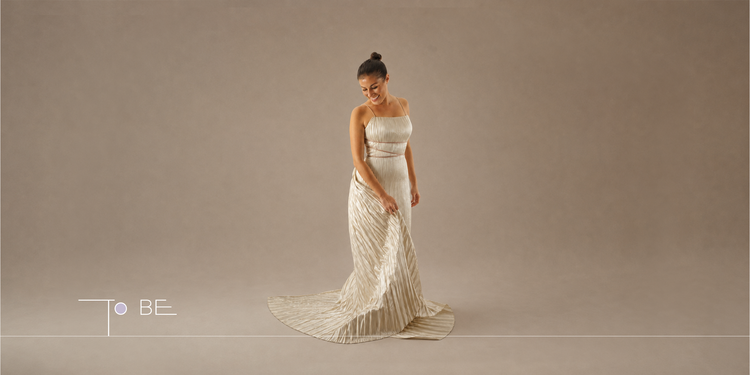 TO BE fashion image showing an elegant pleated gold dress, connecting garment design, styling, and visual storytelling for a fashion concept.