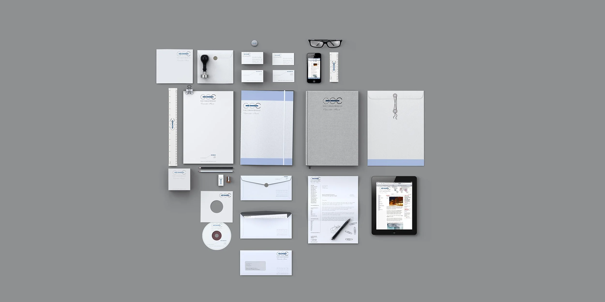 Zilfor brand identity system showing coordinated stationery, business cards, notebook, tablet, CD, pen, ruler, and office communication materials.