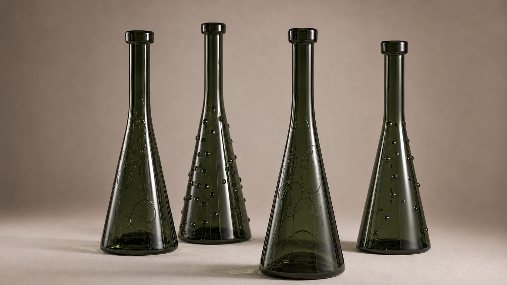 Glass product concept showing tall green vessels with spherical accents, exploring material contrast, object identity, and decorative product language.