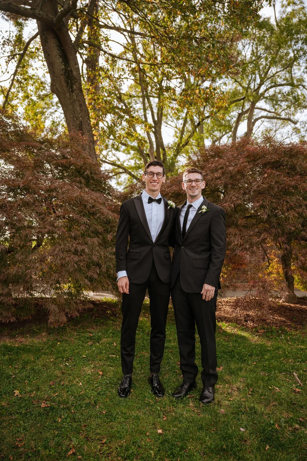 Full wedding party in black suits and mixed metallic gowns, Waveny House Connecticut