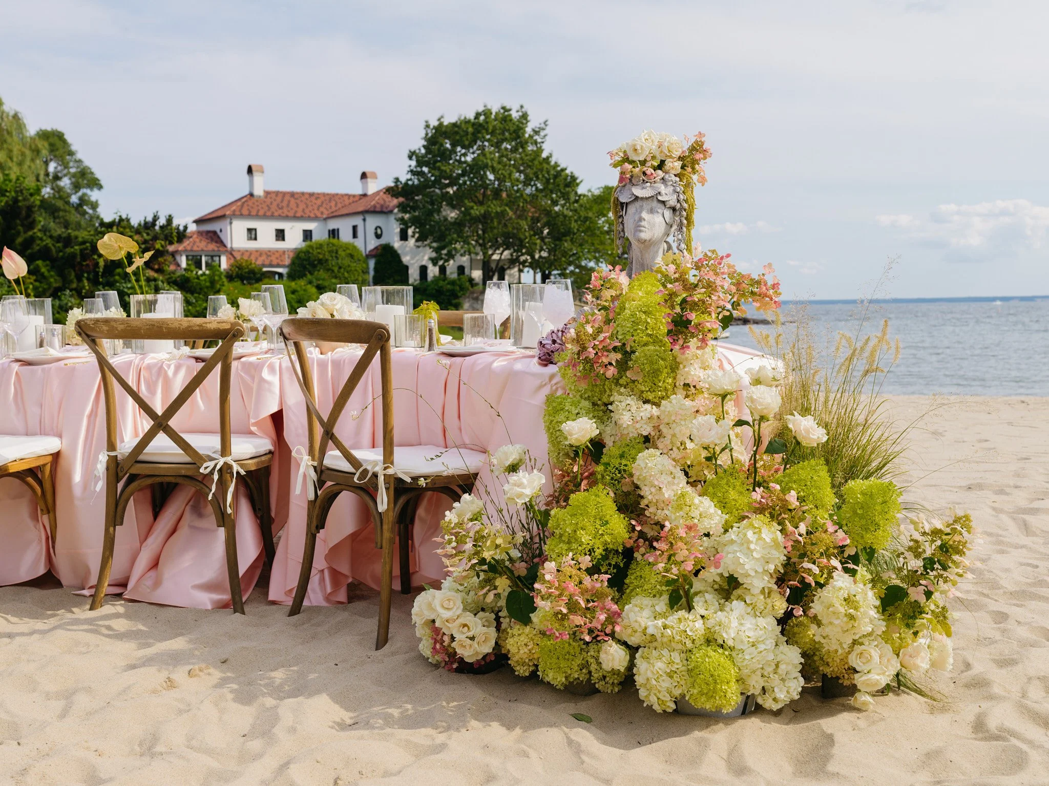 Full hydrangea installation with wild grasses and garden roses, beachside bridal shower design by First Blush Floral Design + Planning