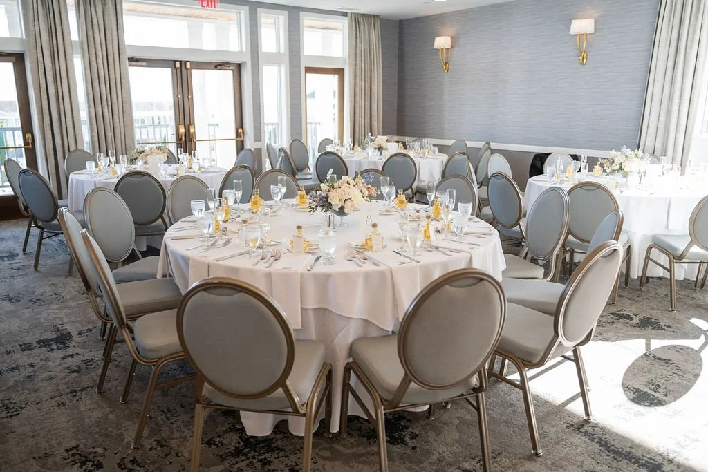 Sweetheart table styled as a garden meadow with lush white and blue floral arrangements at Water's Edge Resort and Spa Connecticut, florals by First Blush Floral Design