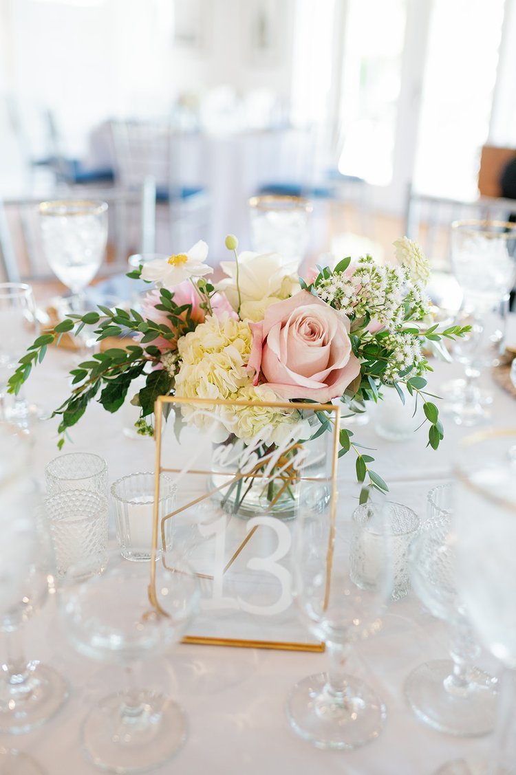 stunning+reception+centerpiece+with+gorgeous+white+and+blush+blossoms.jpg