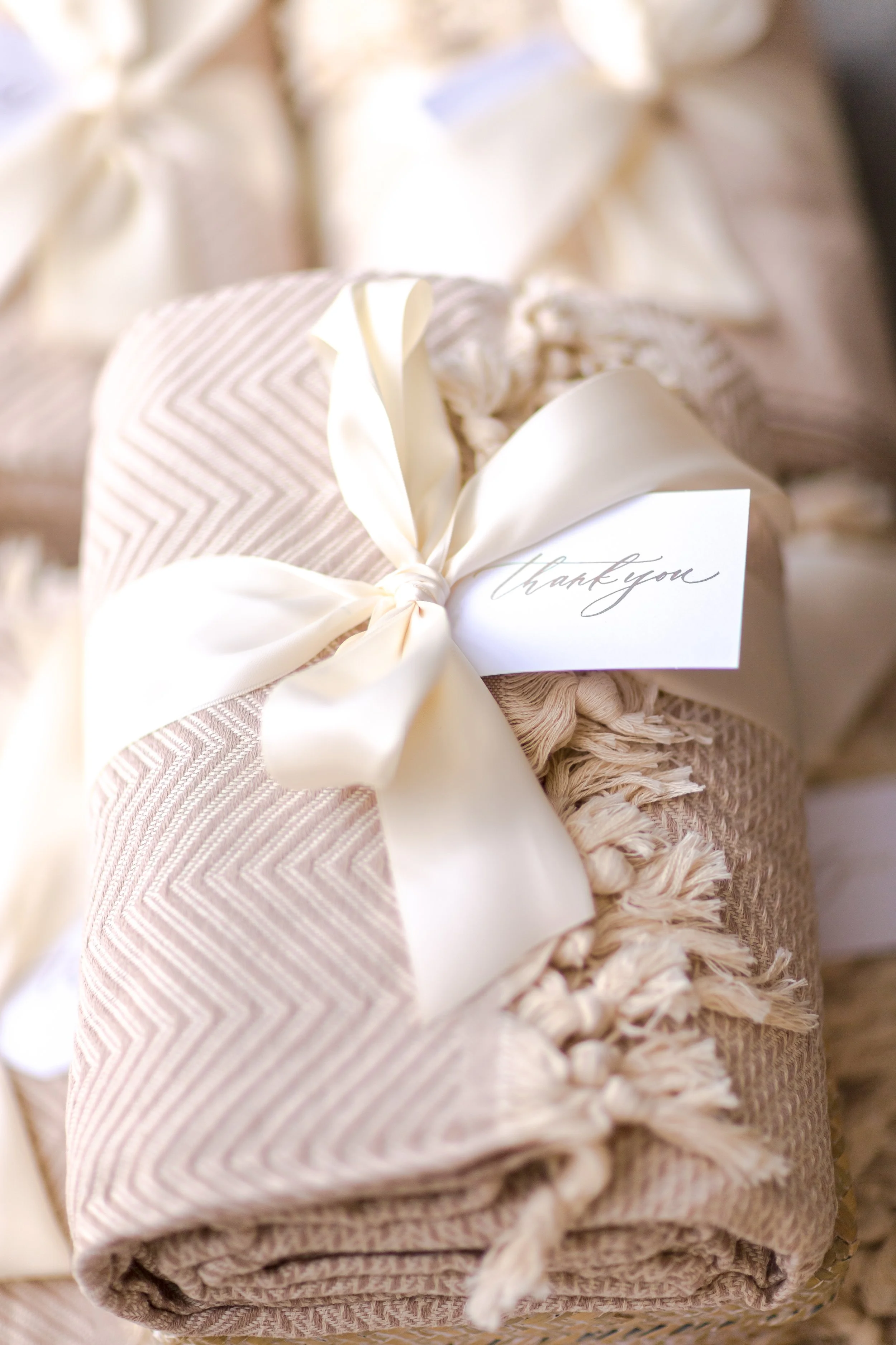 Curated guest gift boxes at a baby shower