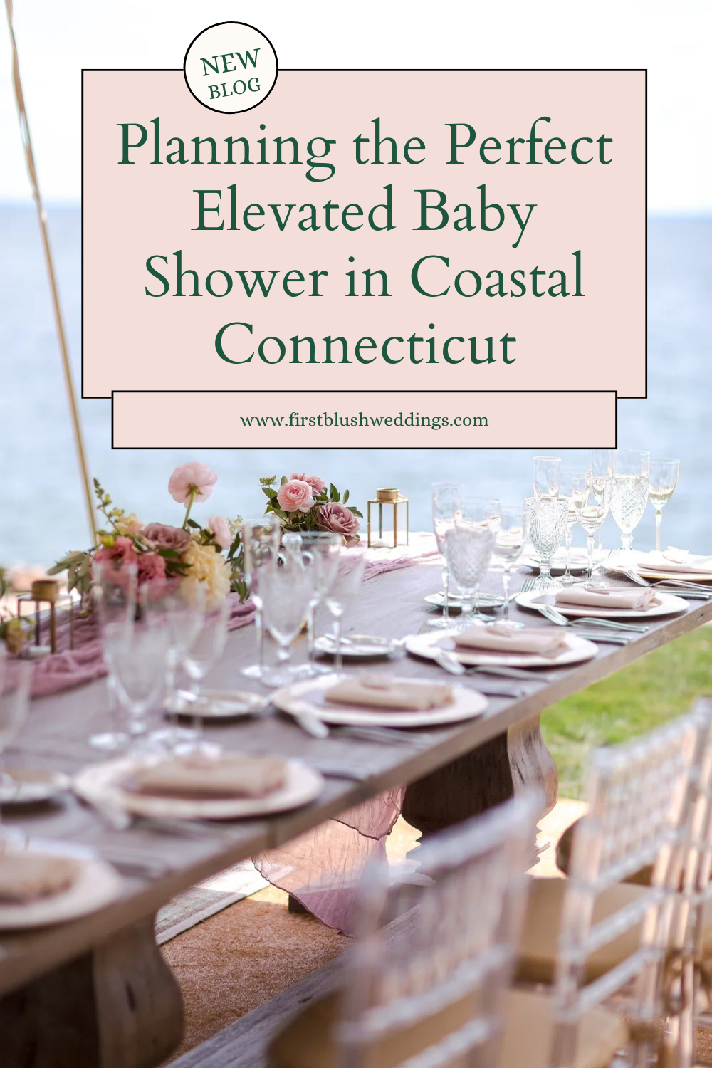 Coastal Connecticut baby shower featuring a long styled table with blush linens, refined floral arrangements, crystal glassware, and an oceanfront backdrop.