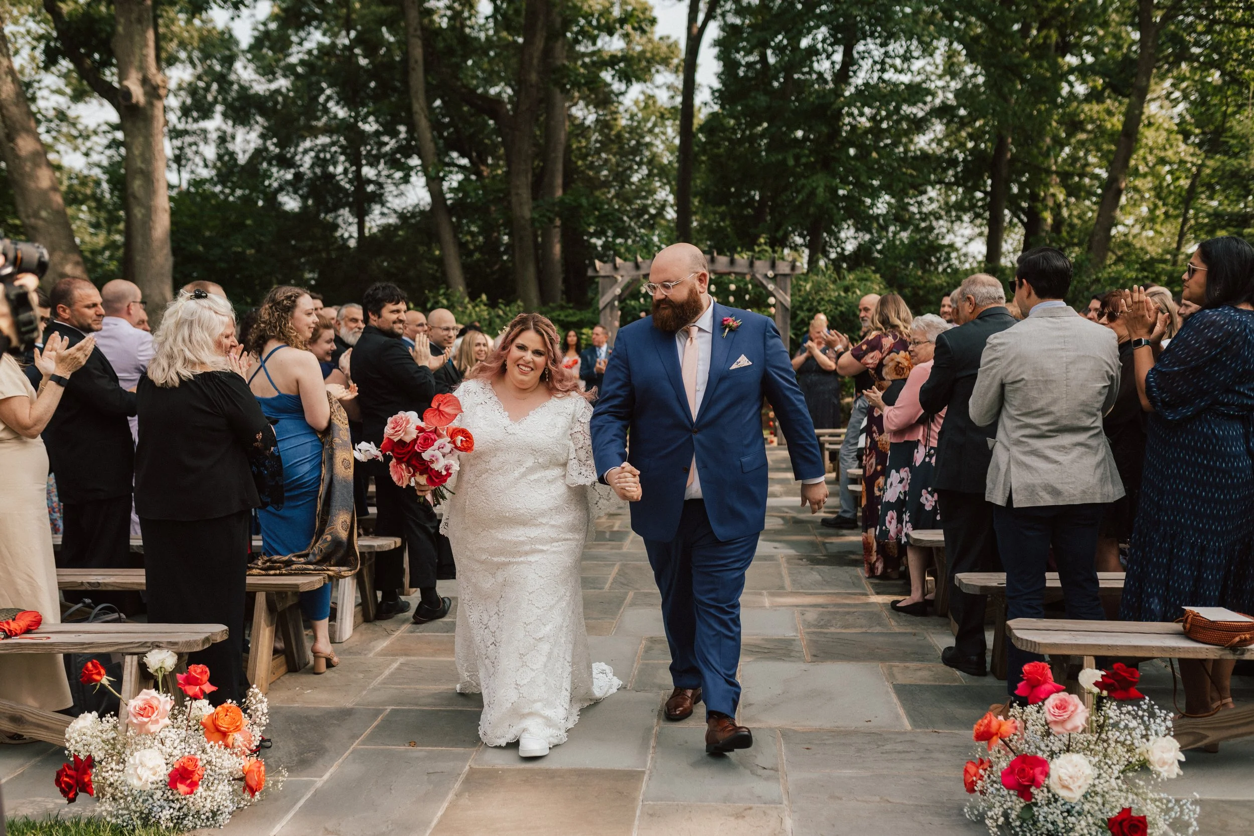 Garden wedding ceremony at The Garden at The Hops in Derby, CT with statement floral design.