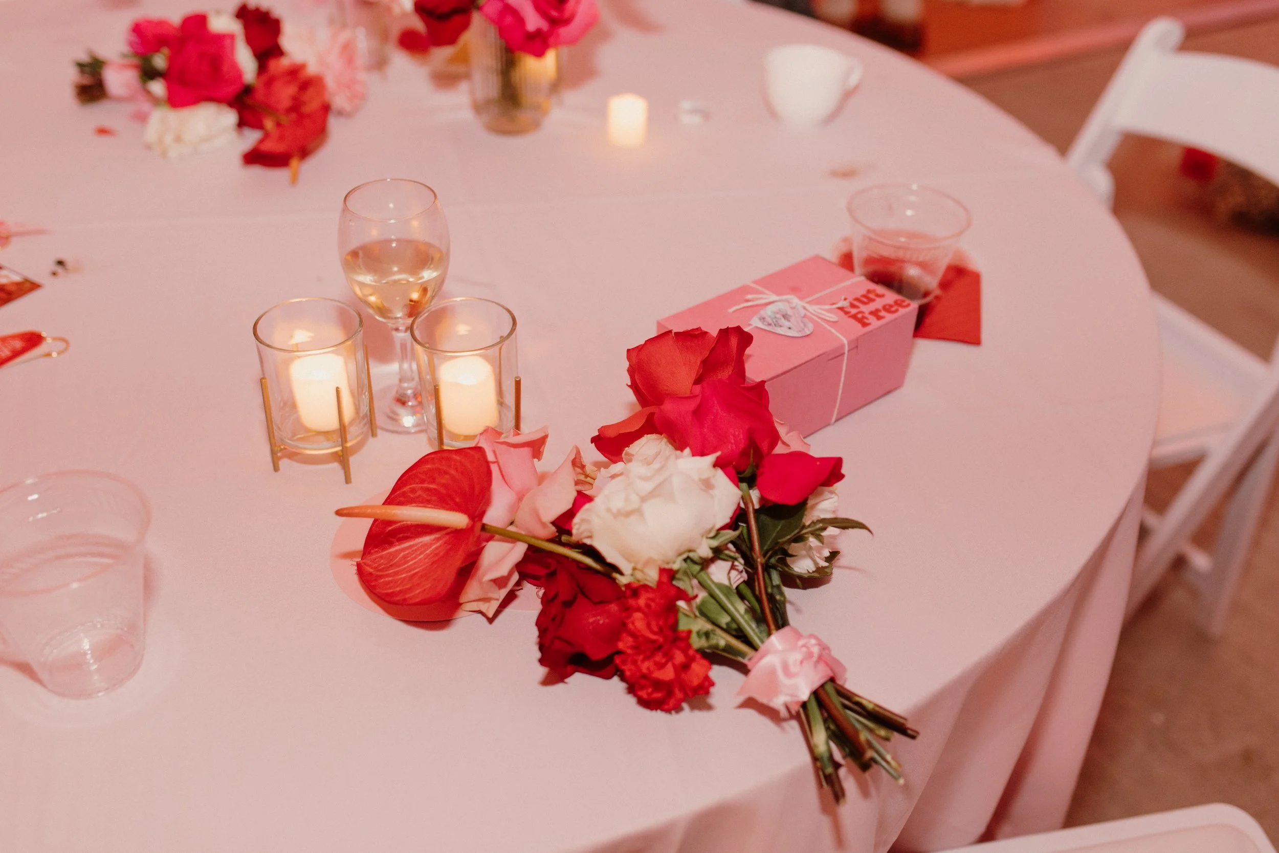 Wedding couple at a garden wedding featuring bold design and expressive florals.