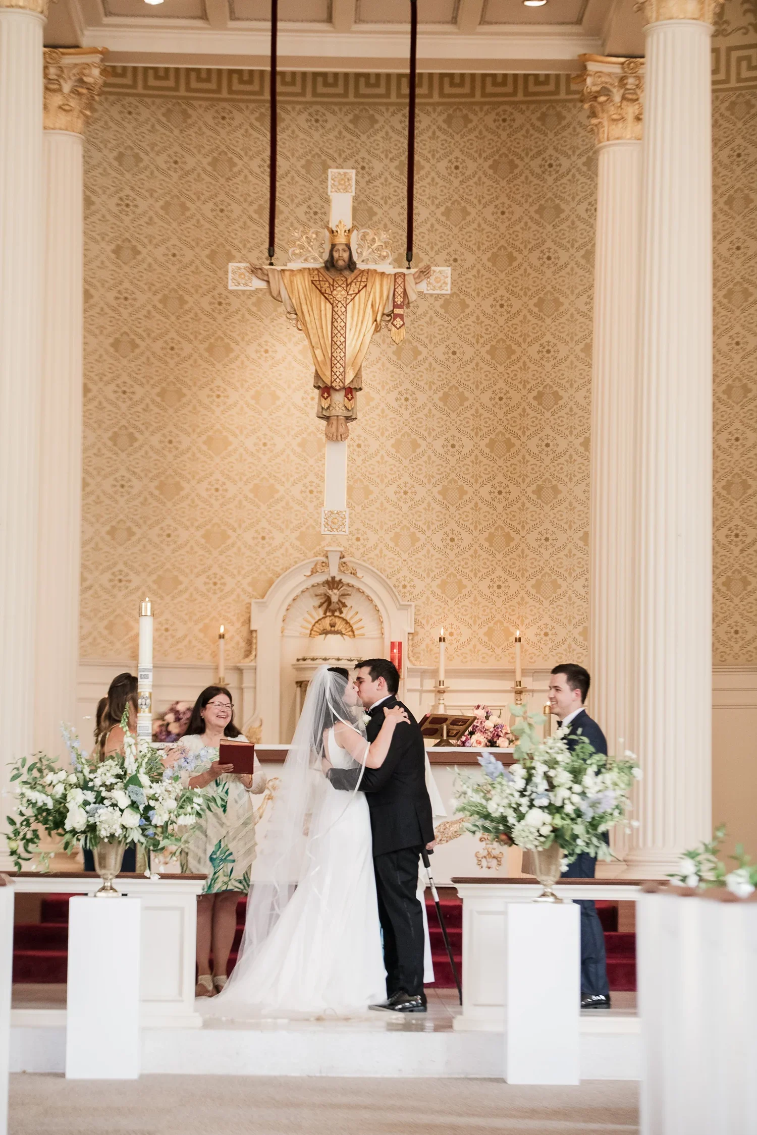 Floral columns designed with seasonal garden blooms for a ceremony at Eolia Mansion in Waterford, Connecticut.