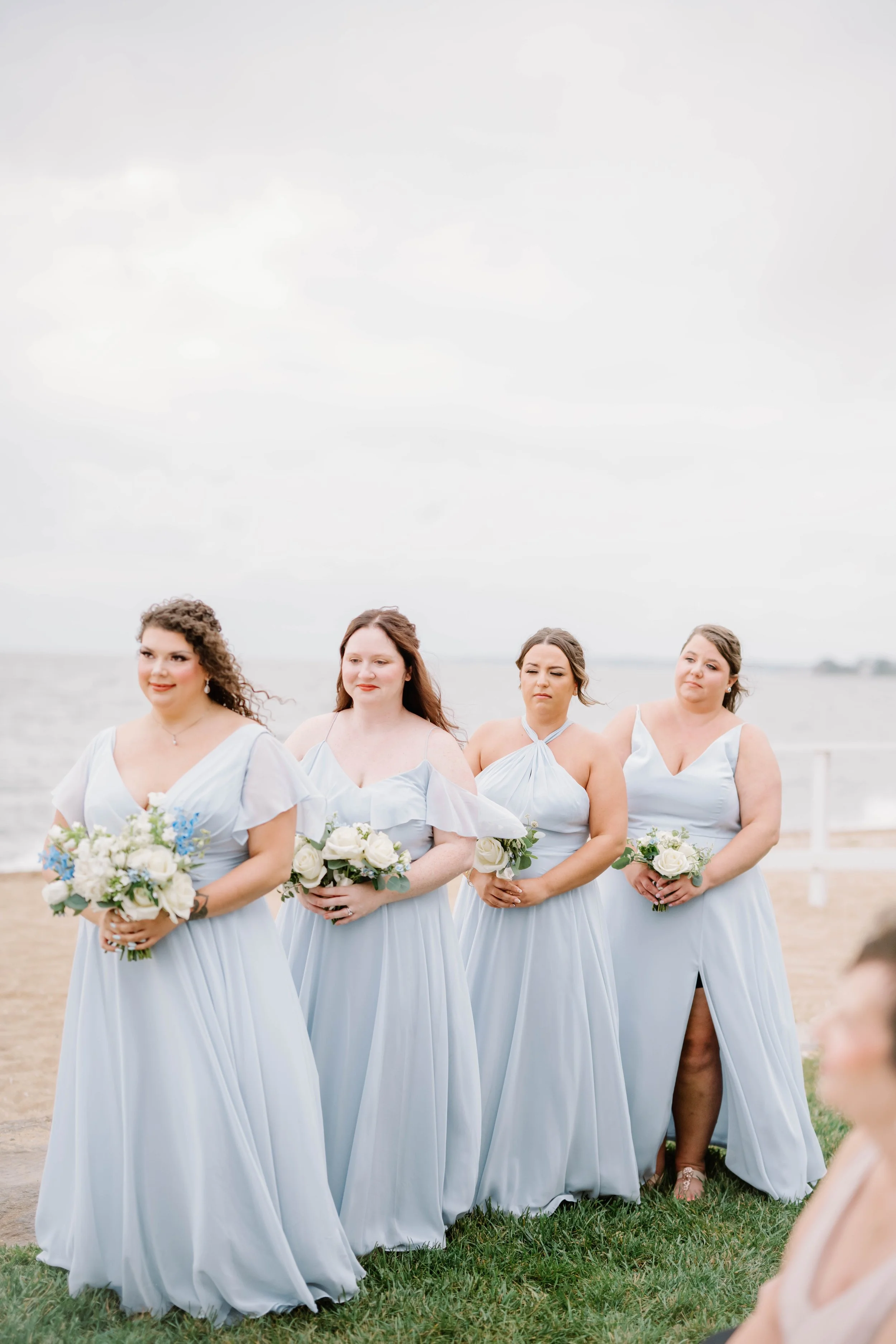 Grounded floral aisle design inspired by seafoam textures and coastal colors.