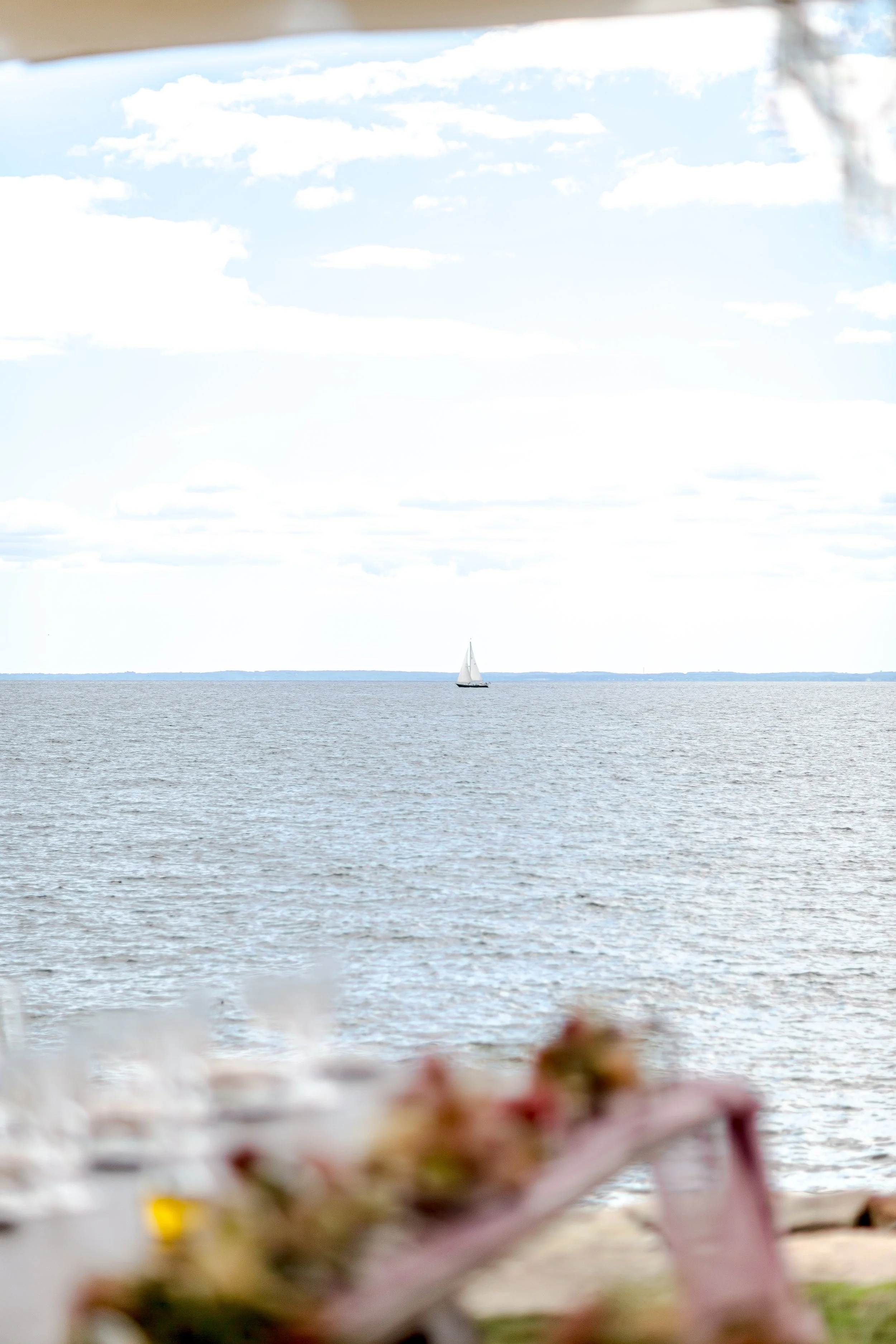 Open-sided baby shower tent overlooking the water in Fairfield County