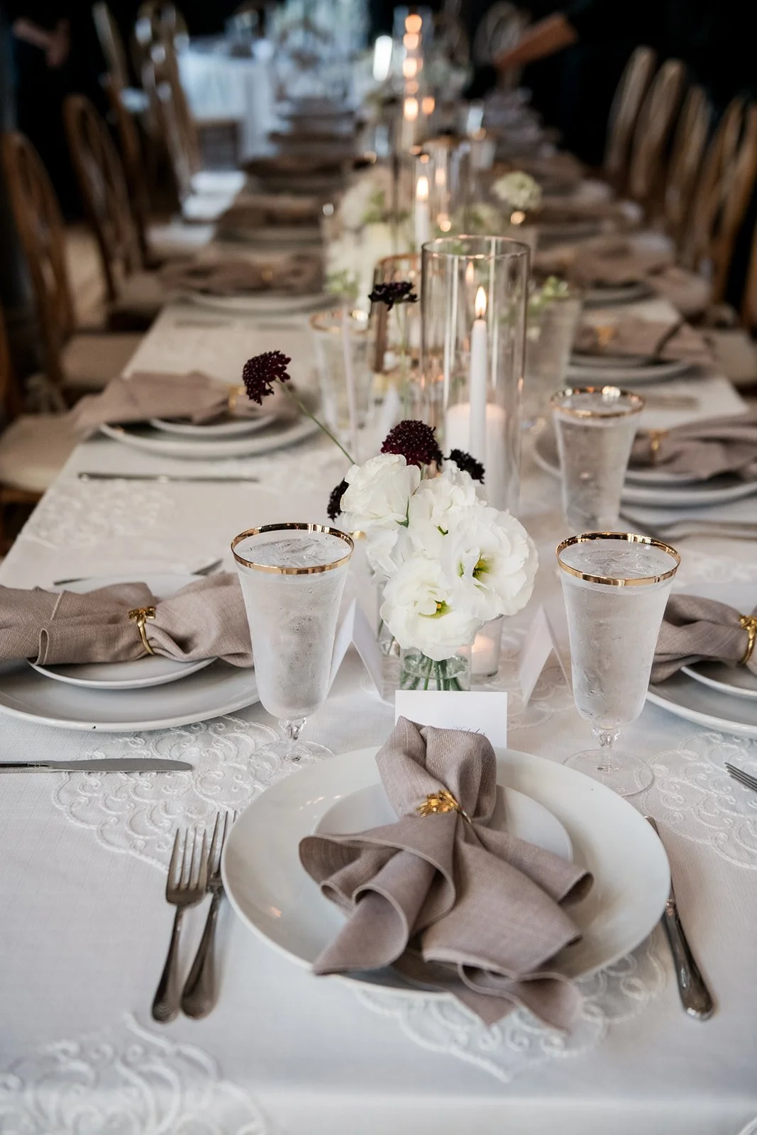 Luxury wedding reception floral design in Connecticut emphasizing texture and architectural balance.