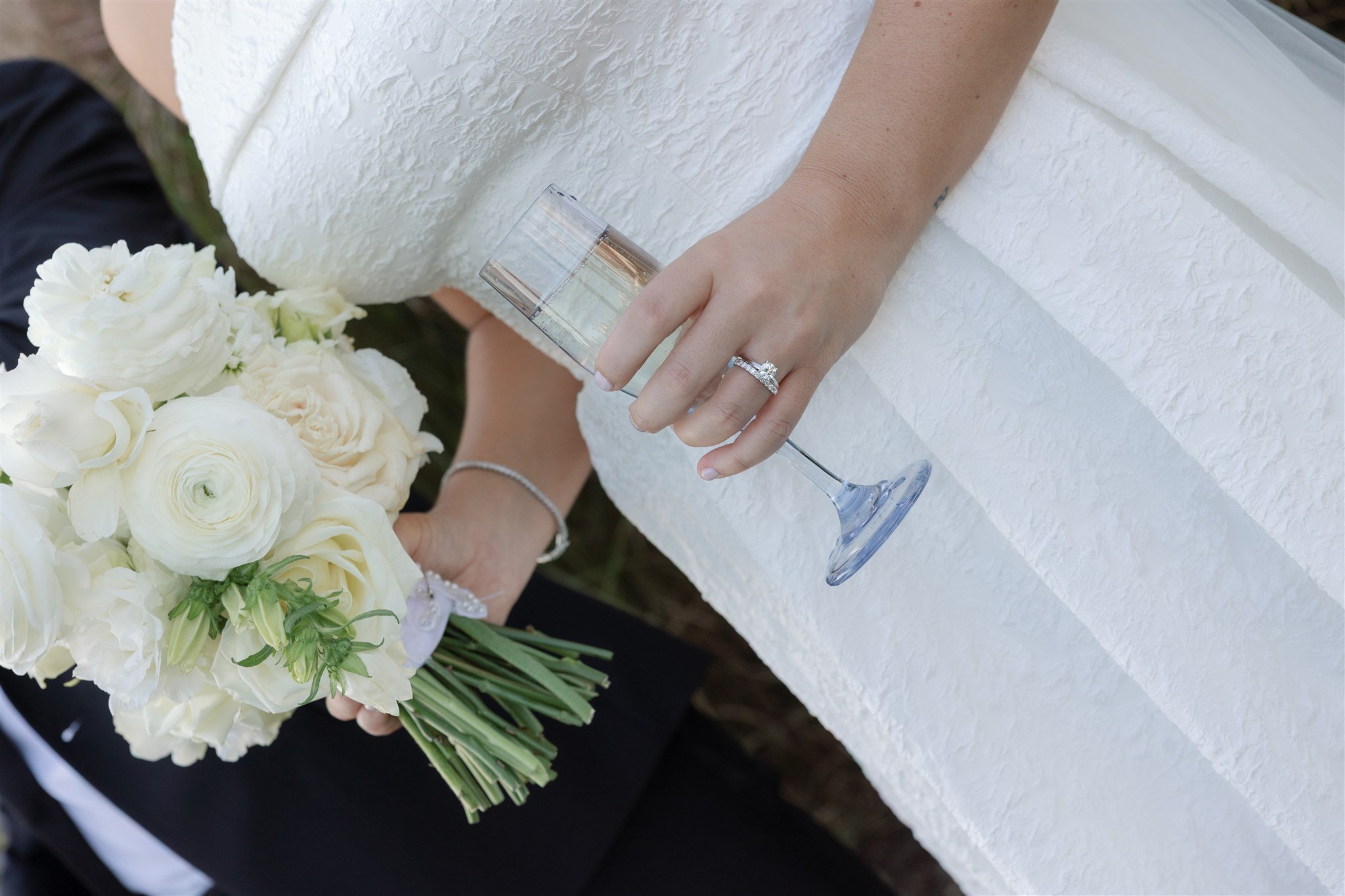 A petite white posy, understated and endlessly elegant.