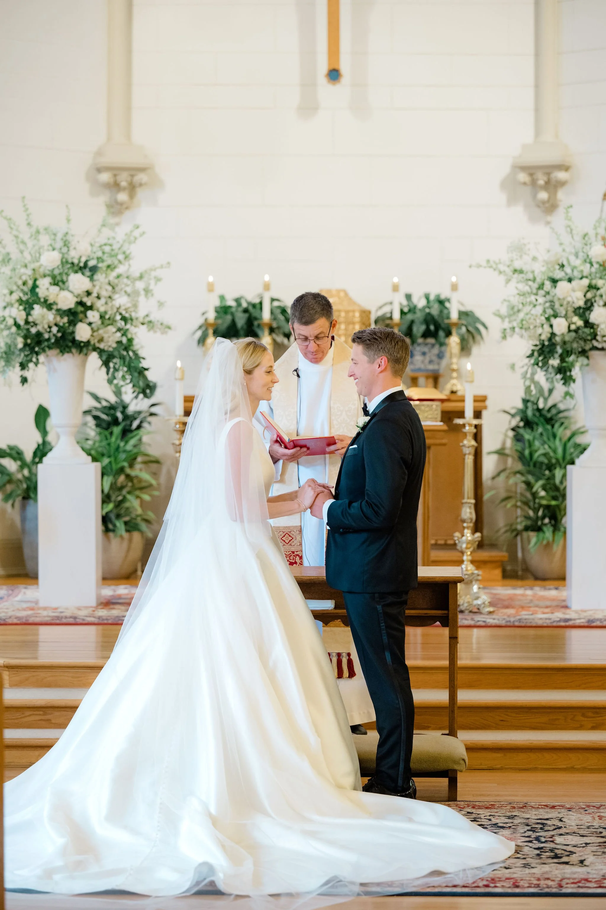 Large white church ceremony floral urns repurposed for a Branford House wedding reception