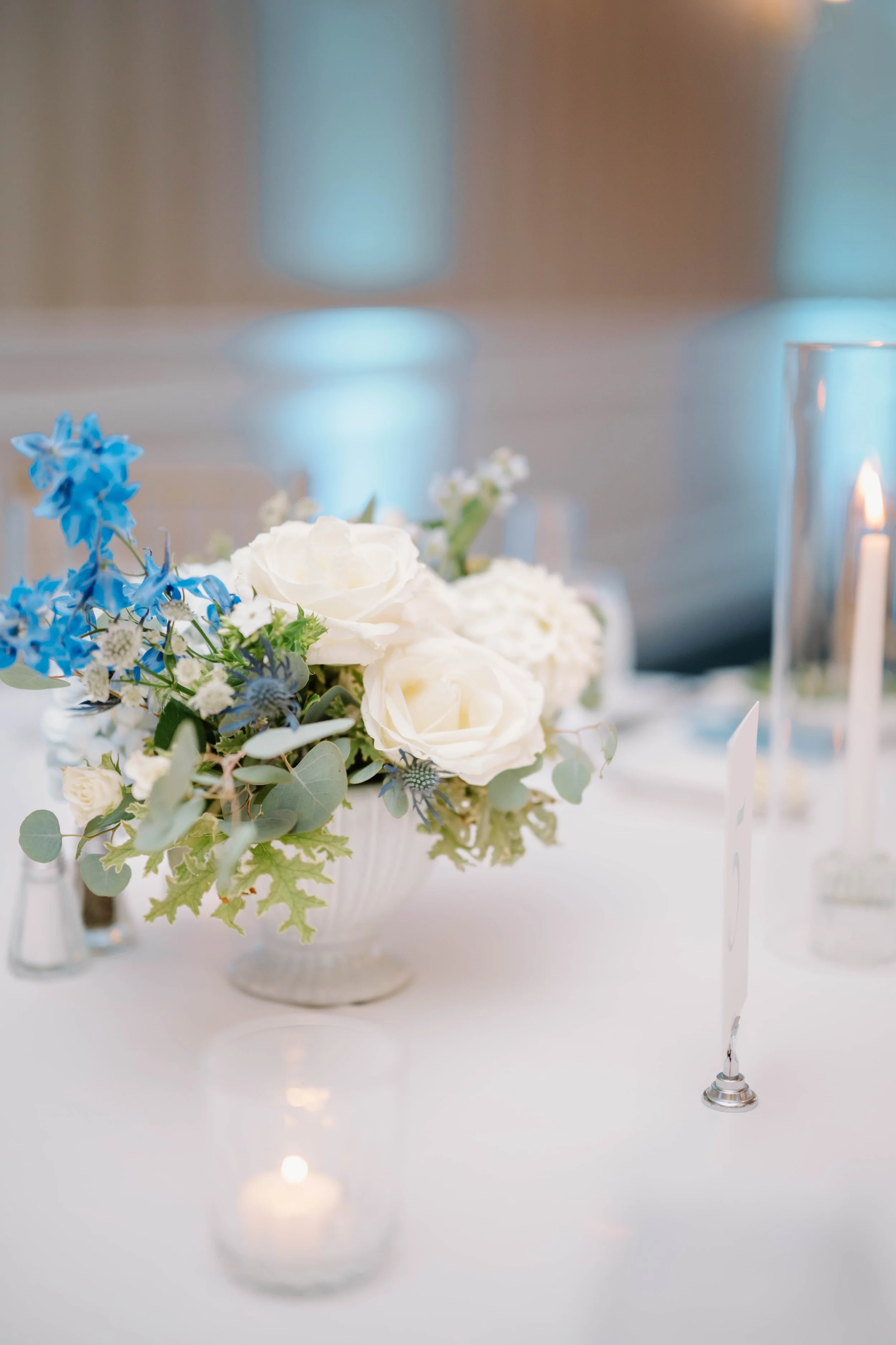 Sustainable floral design with local hydrangea and garden roses in coastal Connecticut reception setting.