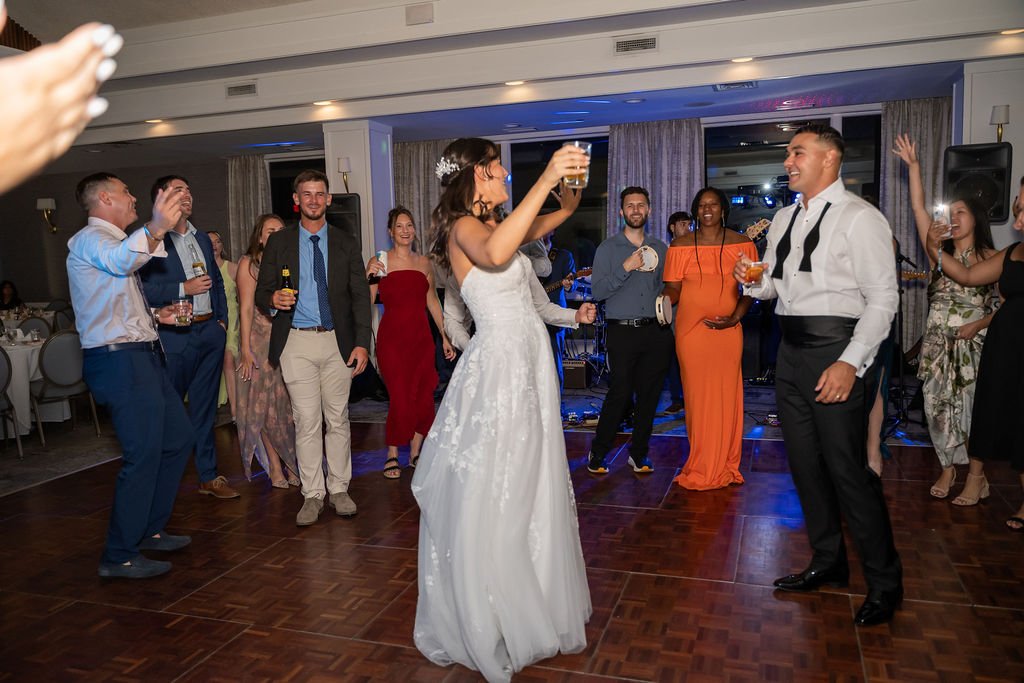 Bride and groom first dance in the waterfront reception ballroom at Water's Edge Resort and Spa Connecticut