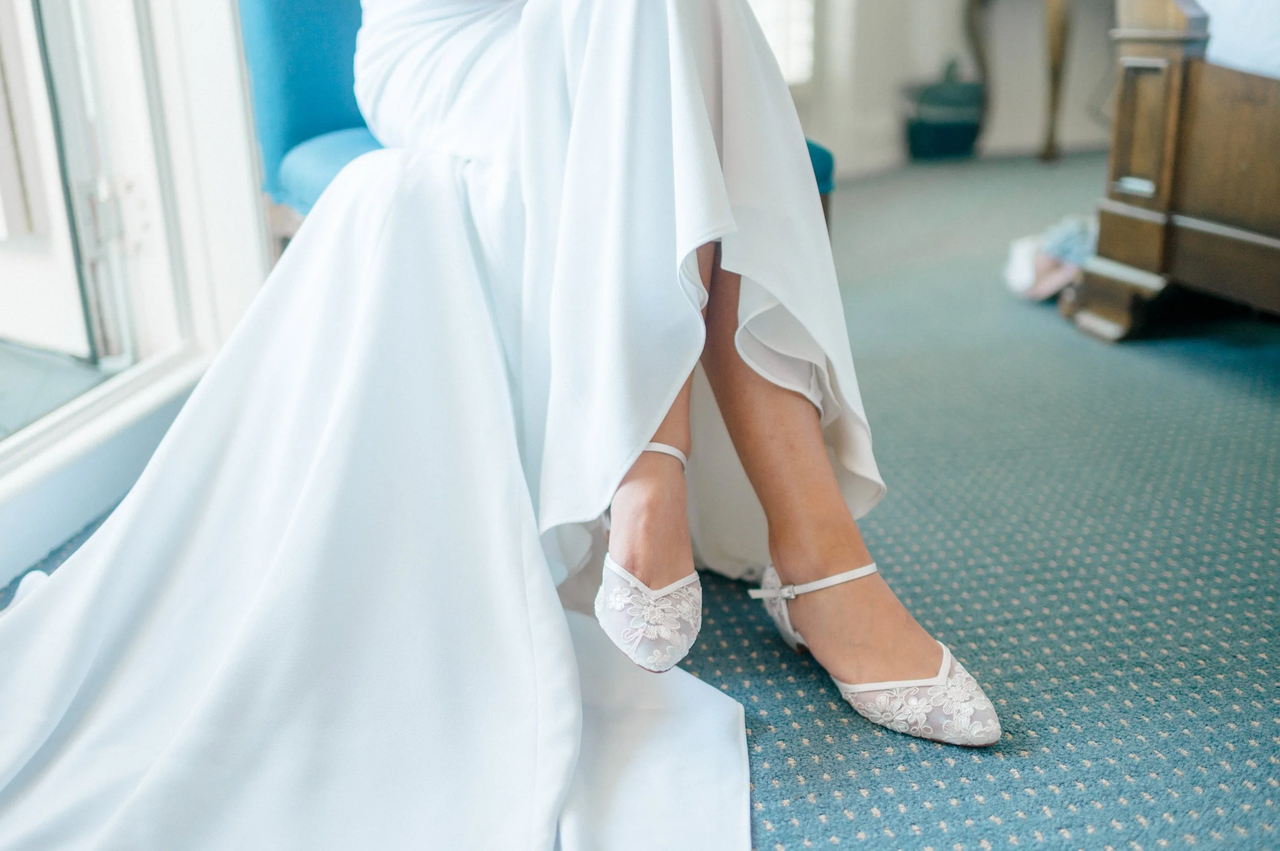 Lace-embellished bridal shoes with vintage-inspired details