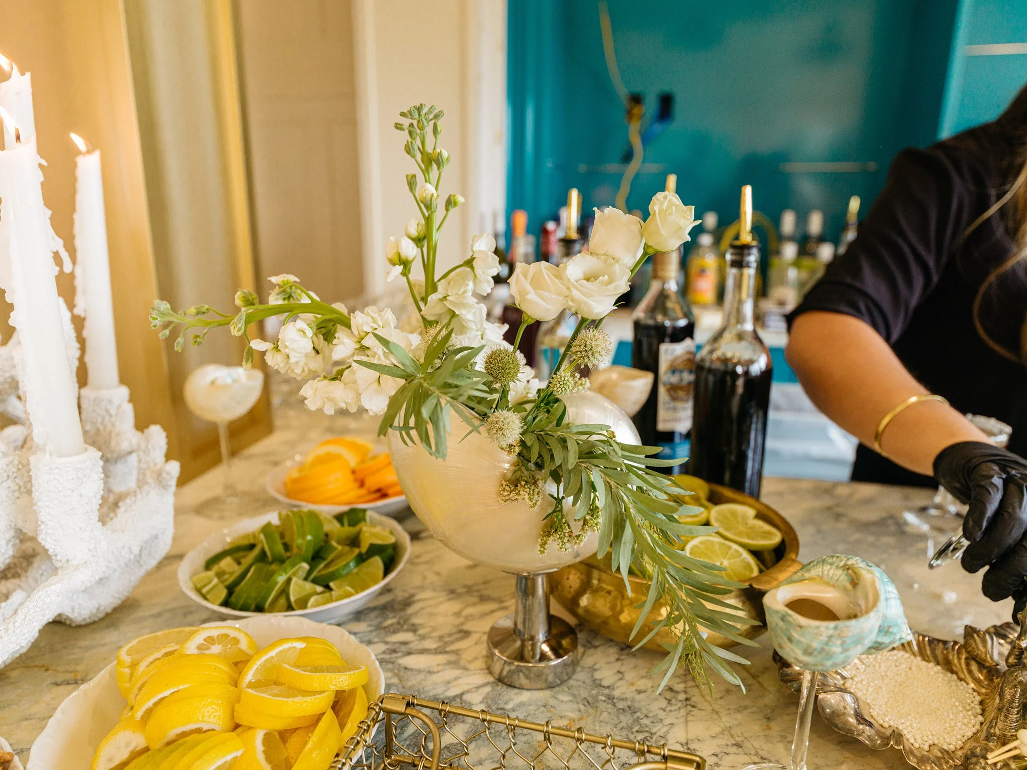Vintage sculptural shell centerpiece styled with pearls, coastal gilded age bridal shower installation Fairfield County