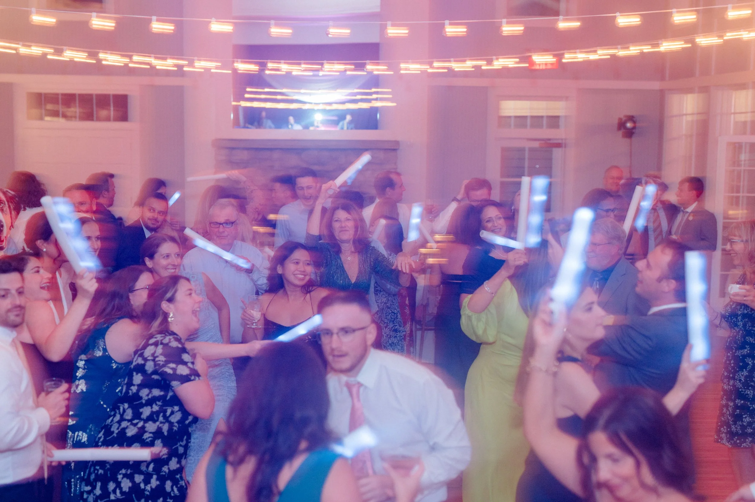 Immersive candlelit reception experience designed for fall coastal wedding