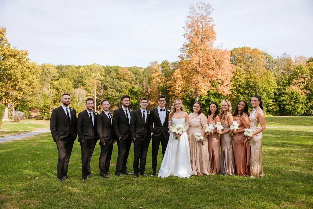 Bridesmaids holding modern rose bouquets during fall Connecticut wedding