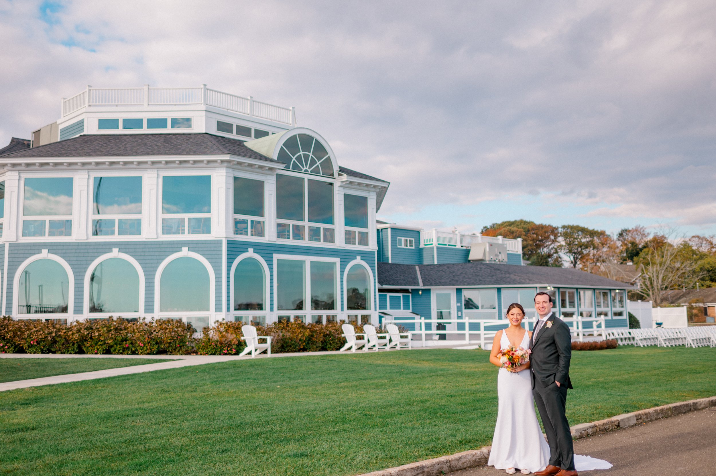 Groom in dark green suit—on-trend look for 2026 weddings