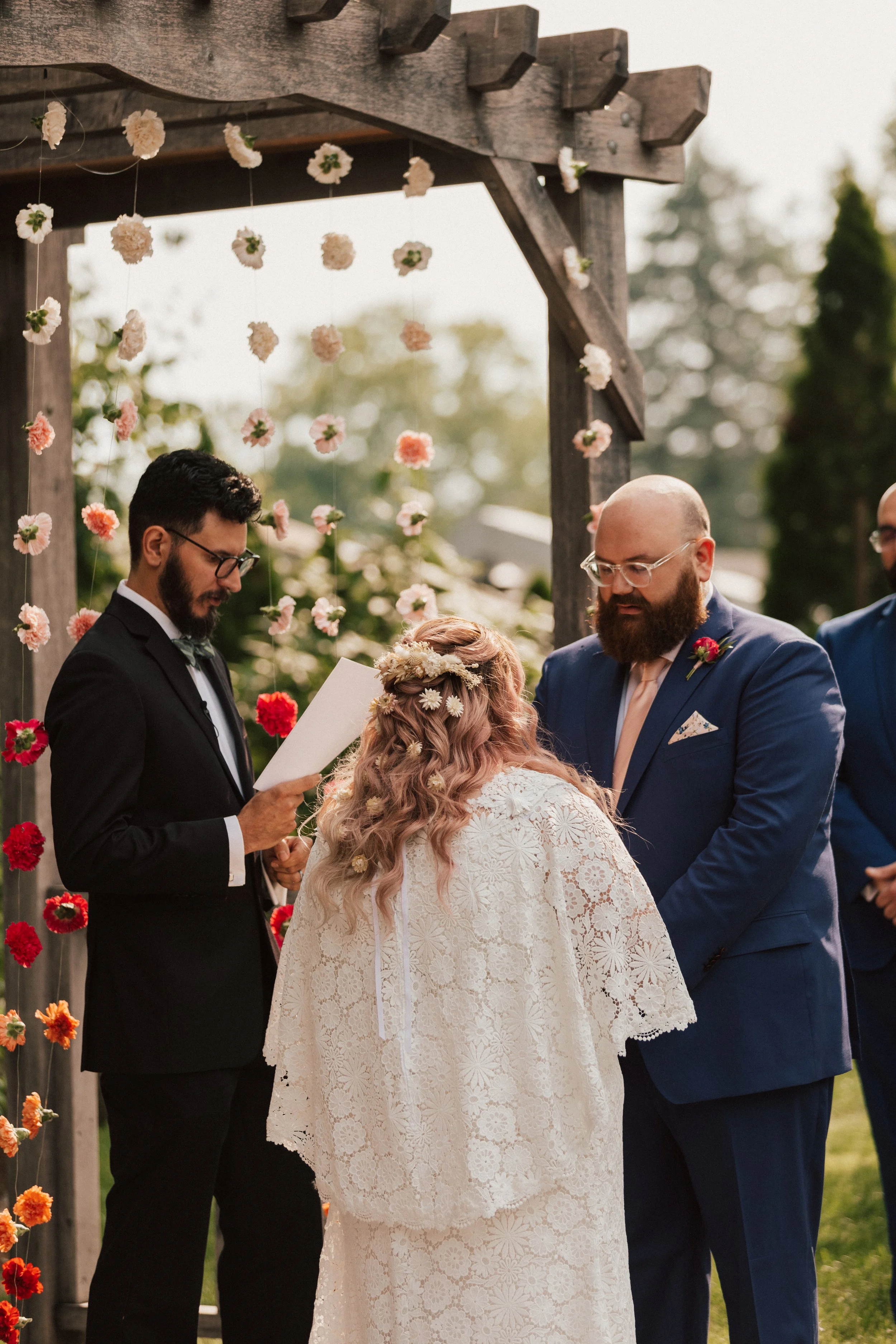 Experiential wedding ceremony design focused on emotion, flow, and bold floral architecture.