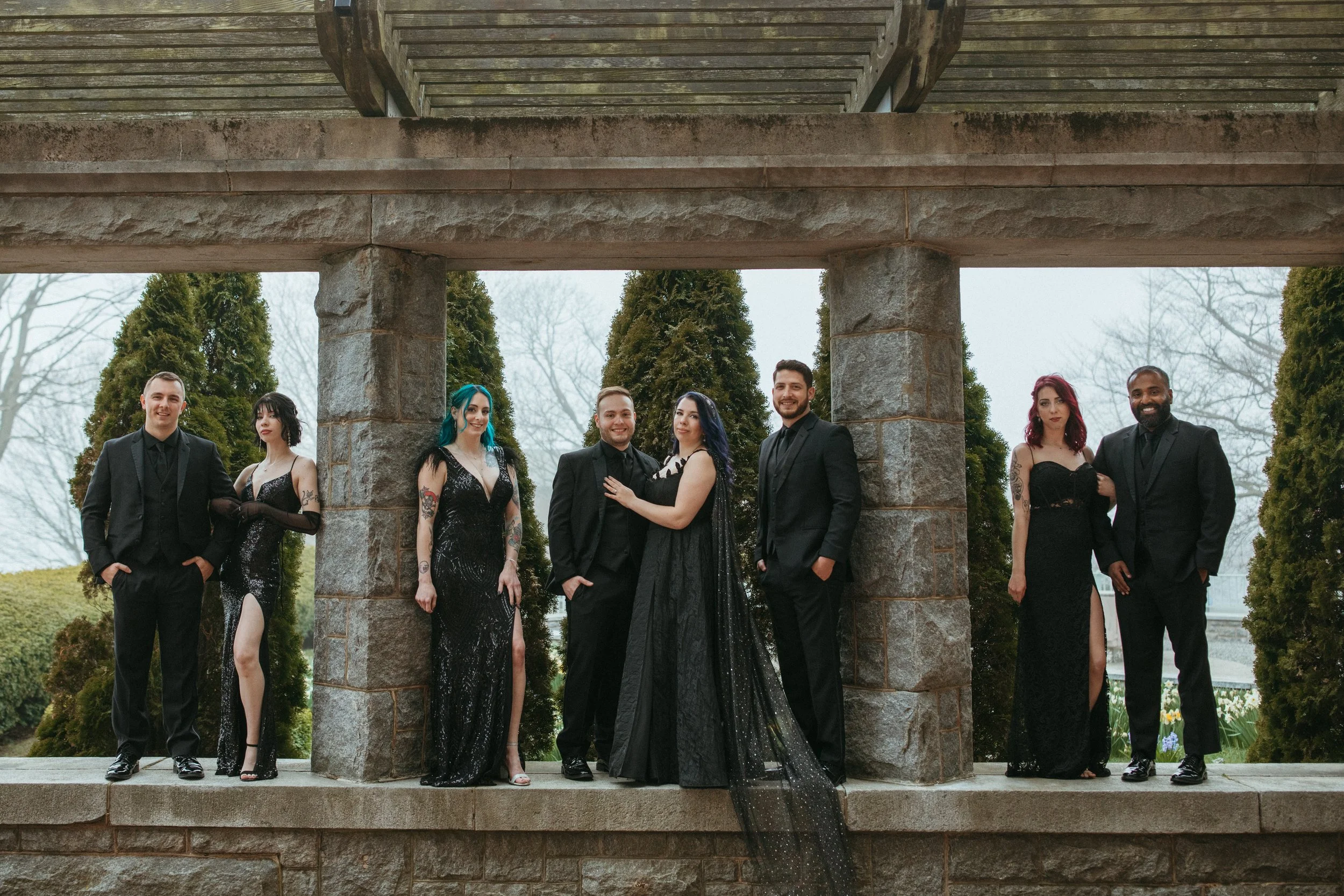 Editorial wedding floral styling with dark plum and indigo blooms at Branford House