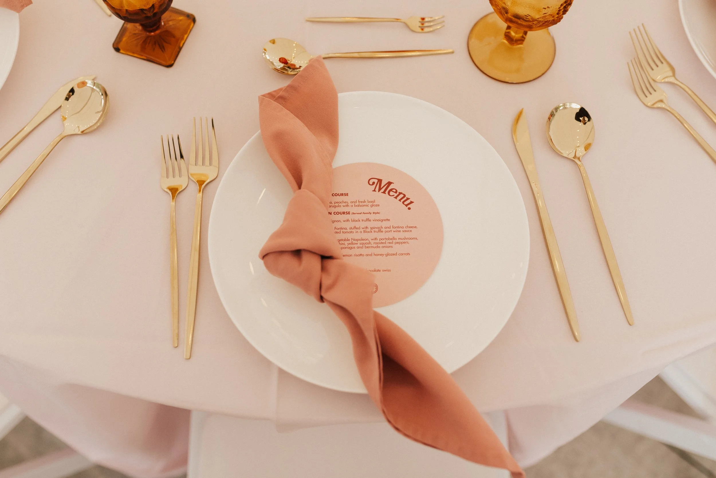 Experiential wedding reception design in Connecticut focused on guest flow, energy, and atmosphere featuring round menus.