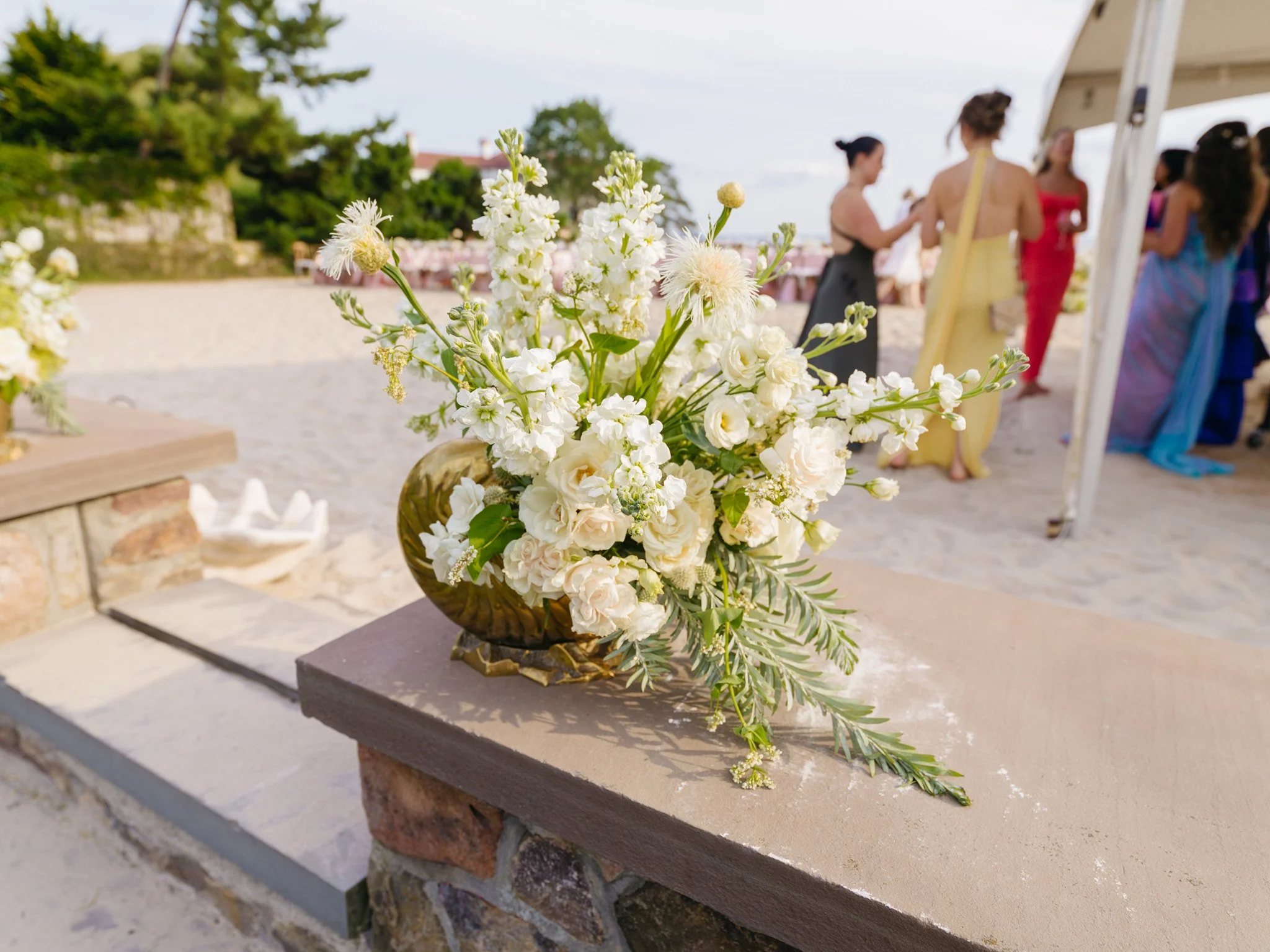Detail shot of local hydrangea and tropical anthurium blended in coastal floral installation